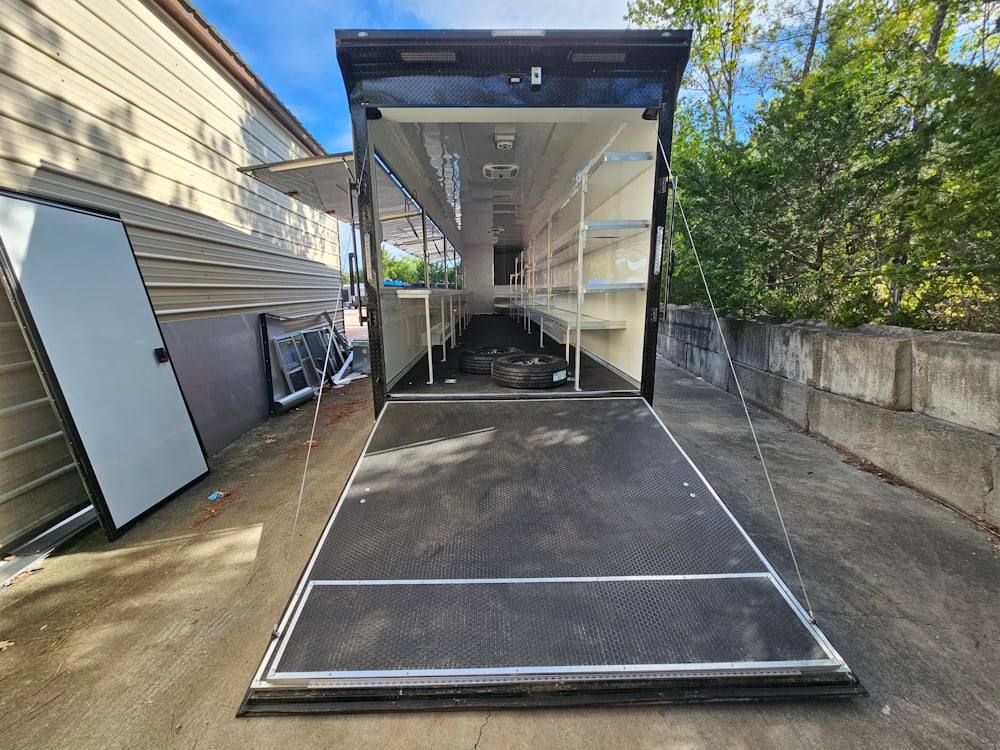 1004-8.5-x-53-charcoal-grey-fireworks-vending-gooseneck-trailer-10.jpg 8.5' X 53' Charcoal Grey Fireworks Vending Gooseneck Trailer