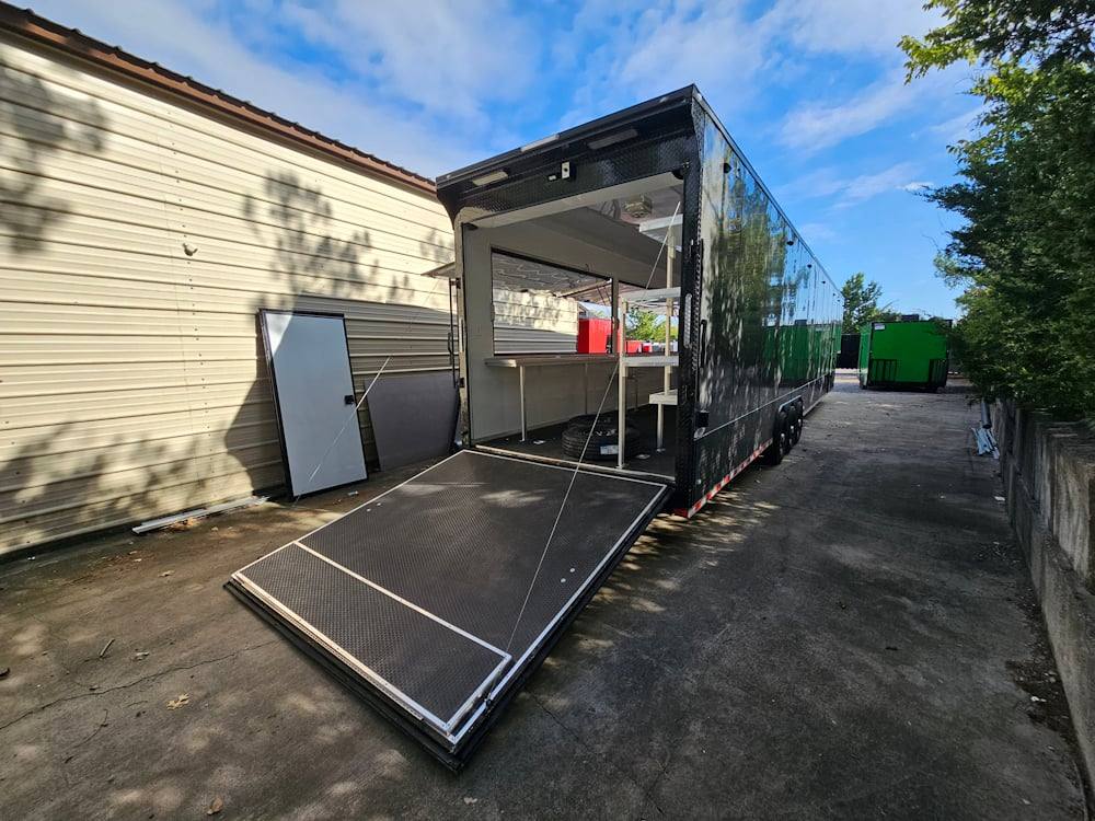 1004-8.5-x-53-charcoal-grey-fireworks-vending-gooseneck-trailer-12.jpg 8.5' X 53' Charcoal Grey Fireworks Vending Gooseneck Trailer