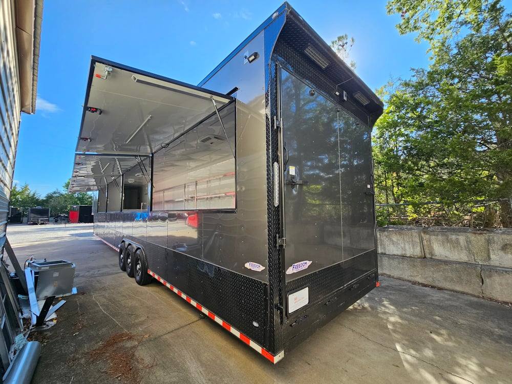 1004-8.5-x-53-charcoal-grey-fireworks-vending-gooseneck-trailer-6.jpg 8.5' X 53' Charcoal Grey Fireworks Vending Gooseneck Trailer