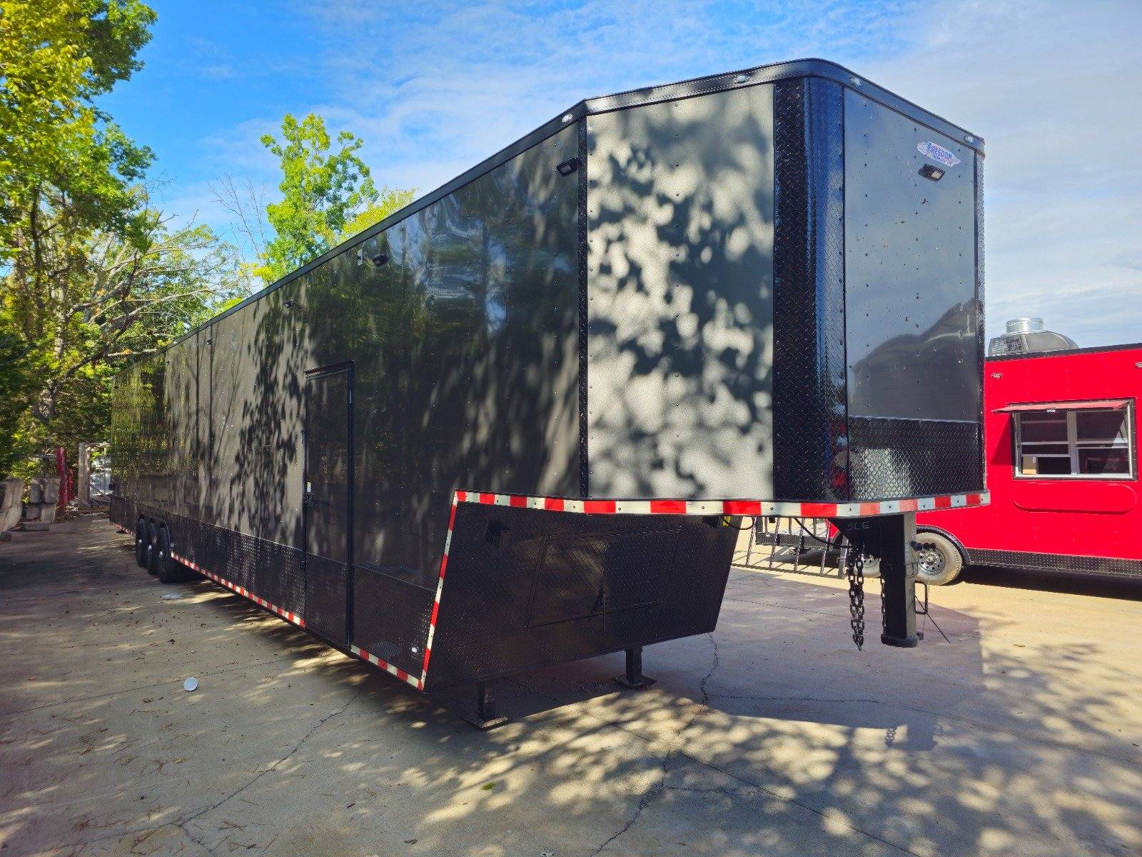 1004-8.5-x-53-charcoal-grey-fireworks-vending-gooseneck-trailer-9.jpg 8.5' X 53' Charcoal Grey Fireworks Vending Gooseneck Trailer