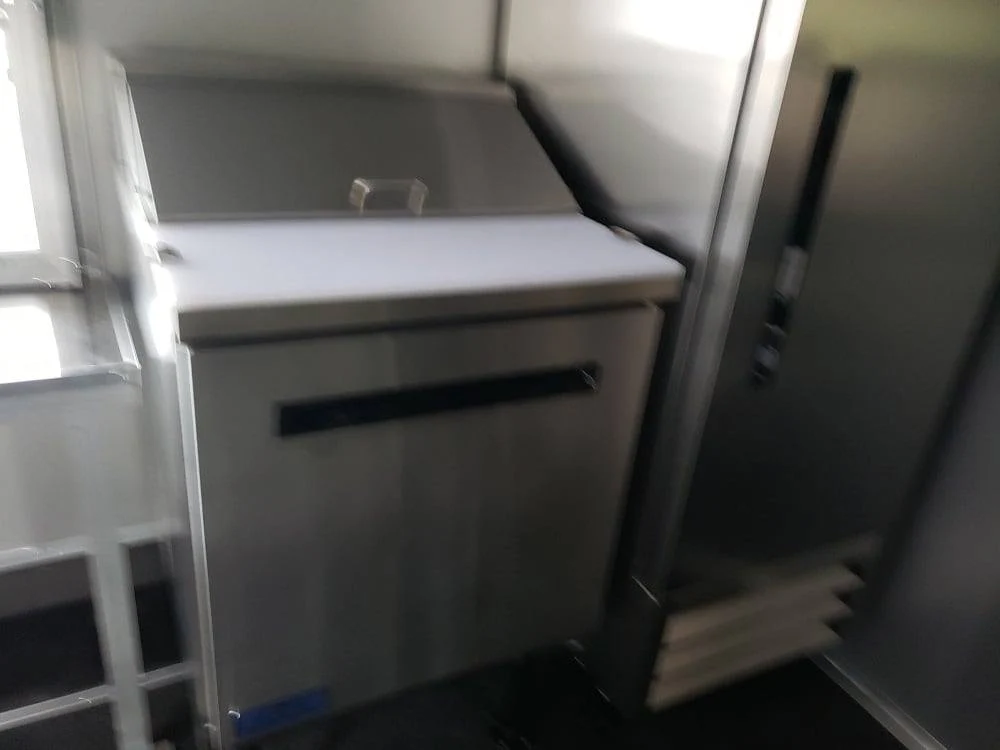 1014-8.5x18-black-orange-concession-food-vending-trailer-with-appliances-13.webp 8.5x18 Black & Orange Concession Food Vending Trailer with Appliances