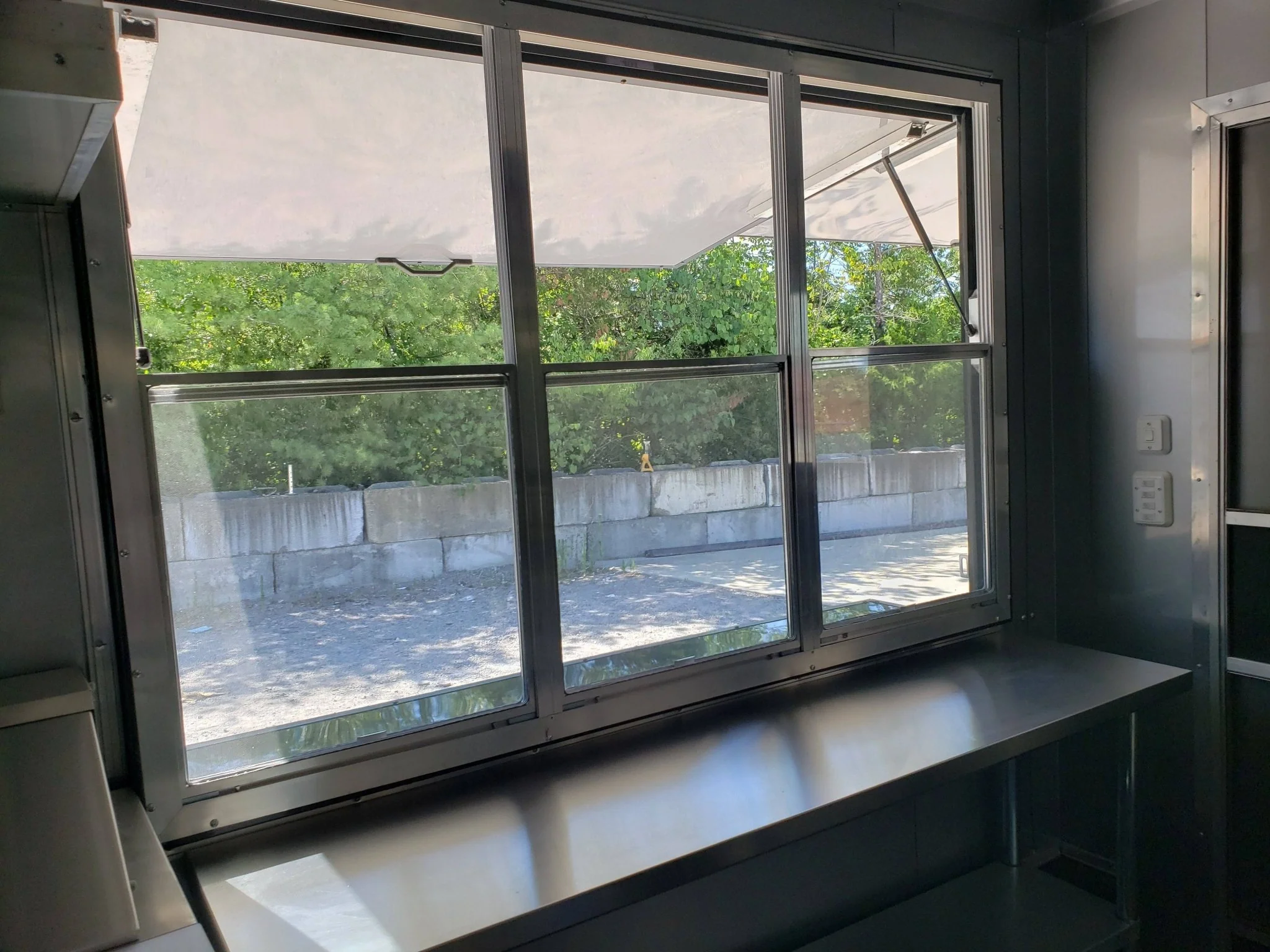 1027-black-out-8.5-x-28-porch-style-concession-food-trailer-28.webp Black Out 8.5' x 28' Porch Style Concession Food Trailer