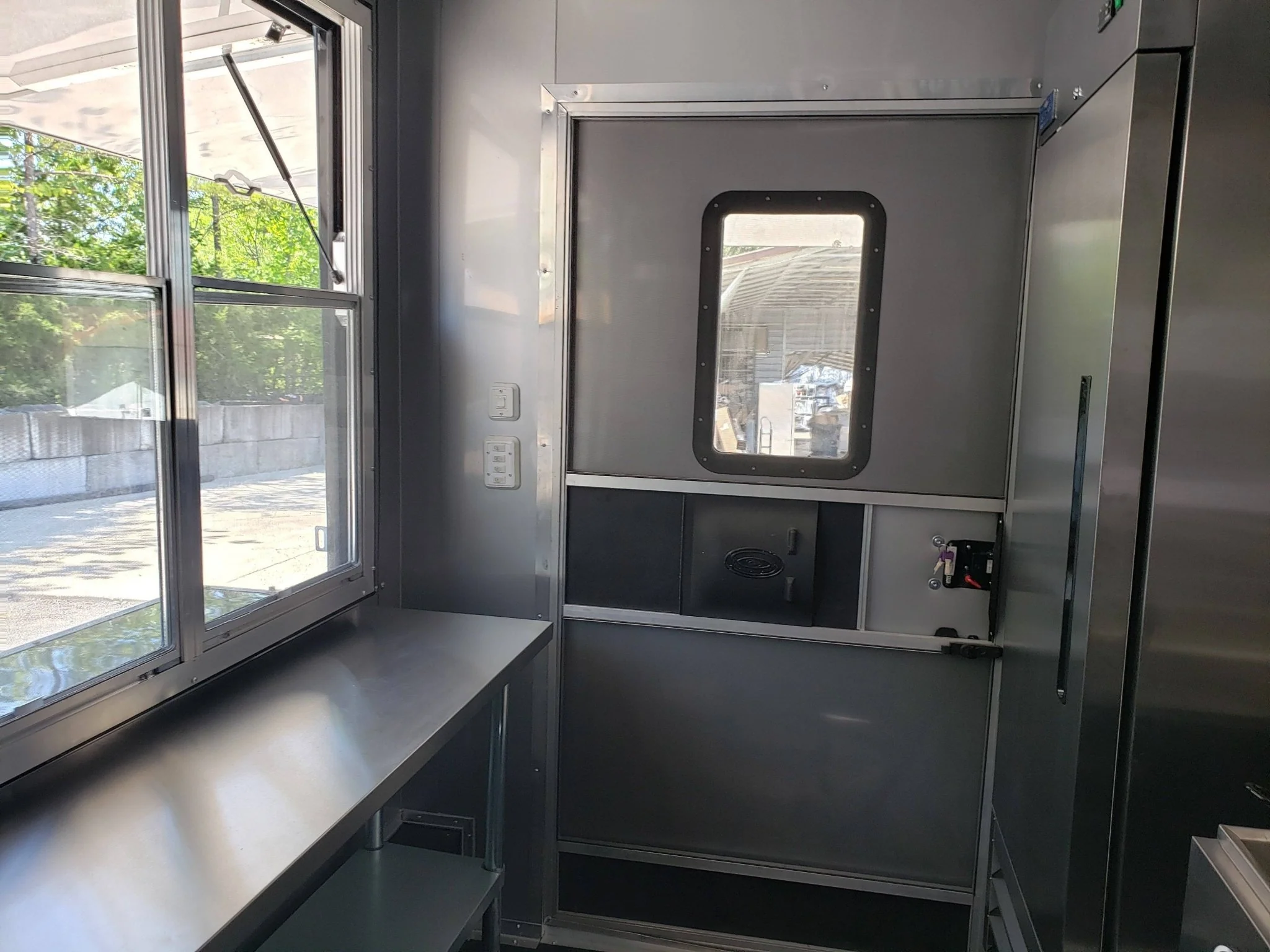 Black Out 8.5' x 28' Porch Style Concession Food Trailer With Appliances