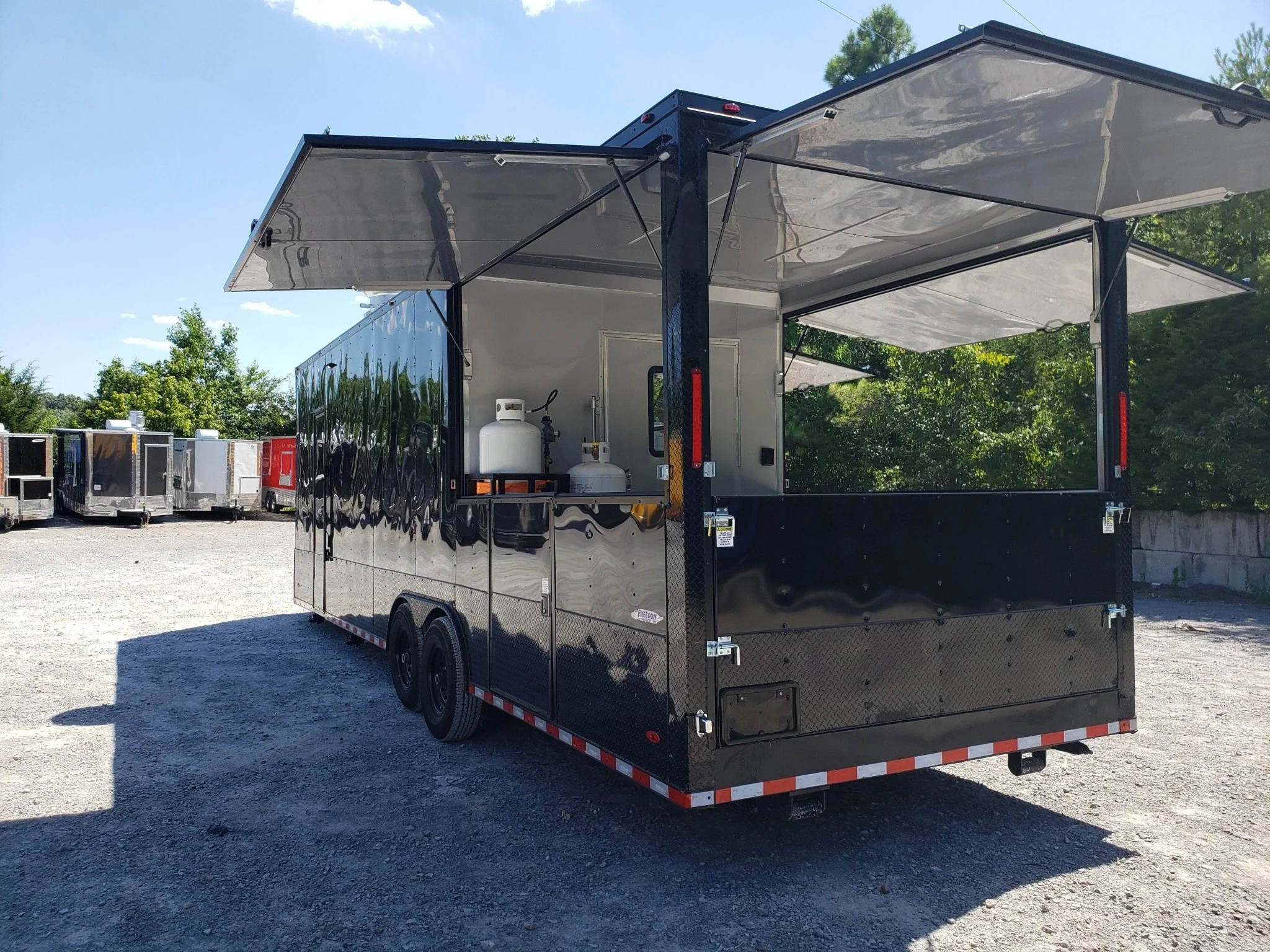 Black Out 8.5' x 28' Porch Style Concession Food Trailer With Appliances