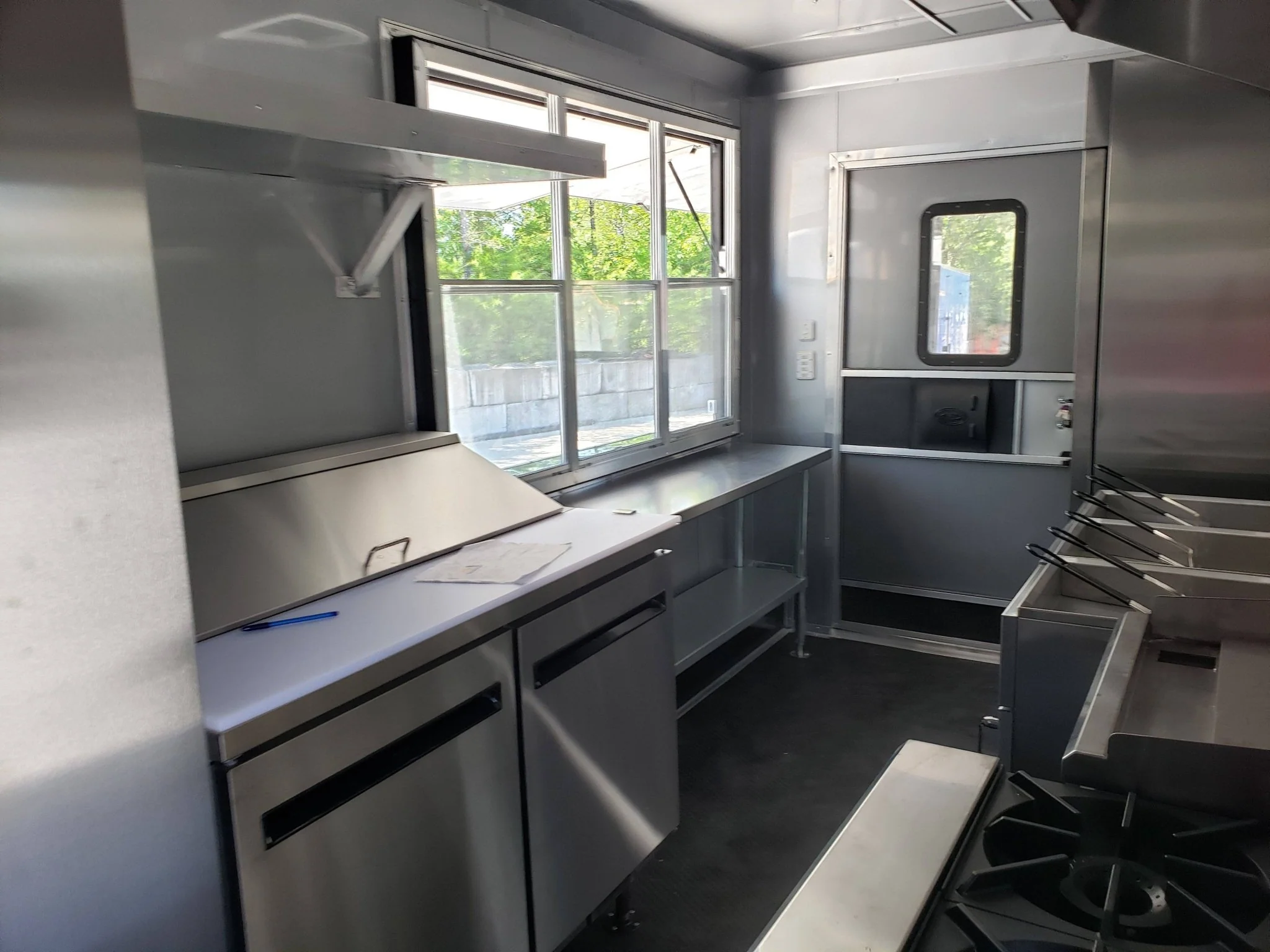 Black Out 8.5' x 28' Porch Style Concession Food Trailer With Appliances