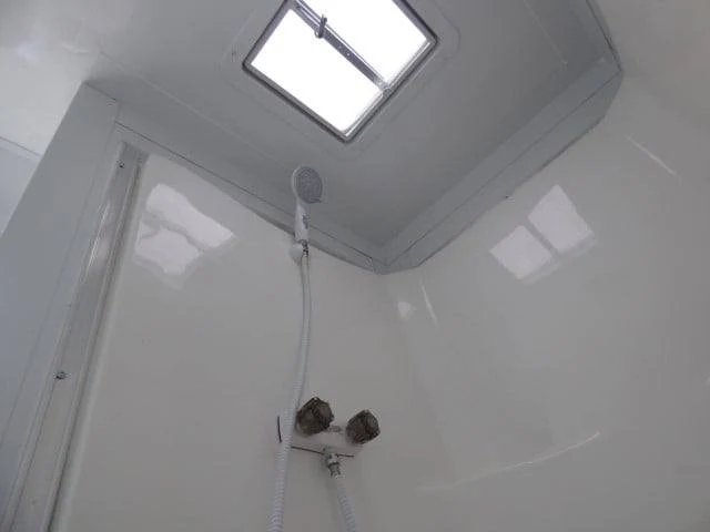 1058-concession-trailer-8.5-x-24-white-shower-trailer-10.webp Concession Trailer 8.5 X 24 White Shower Trailer
