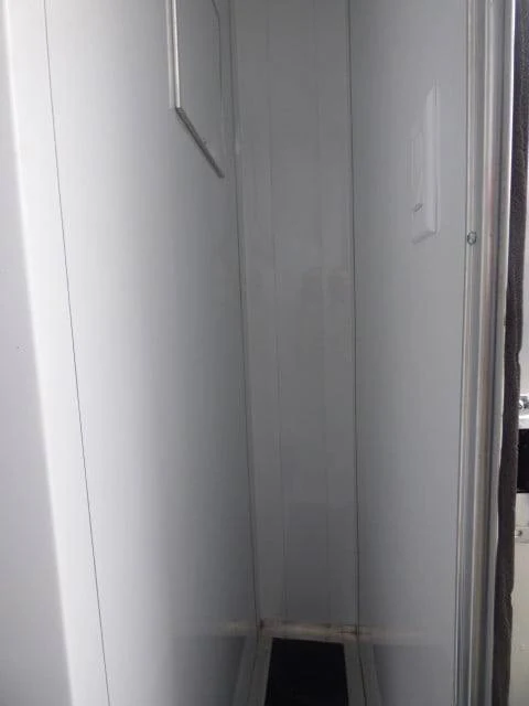 1058-concession-trailer-8.5-x-24-white-shower-trailer-2.webp Concession Trailer 8.5 X 24 White Shower Trailer
