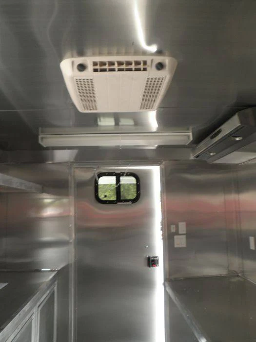 1327-concession-trailer-8.5-x20-white-bbq-smoker-event-catering-4.webp Concession Trailer 8.5'x20' White - BBQ Smoker Event Catering