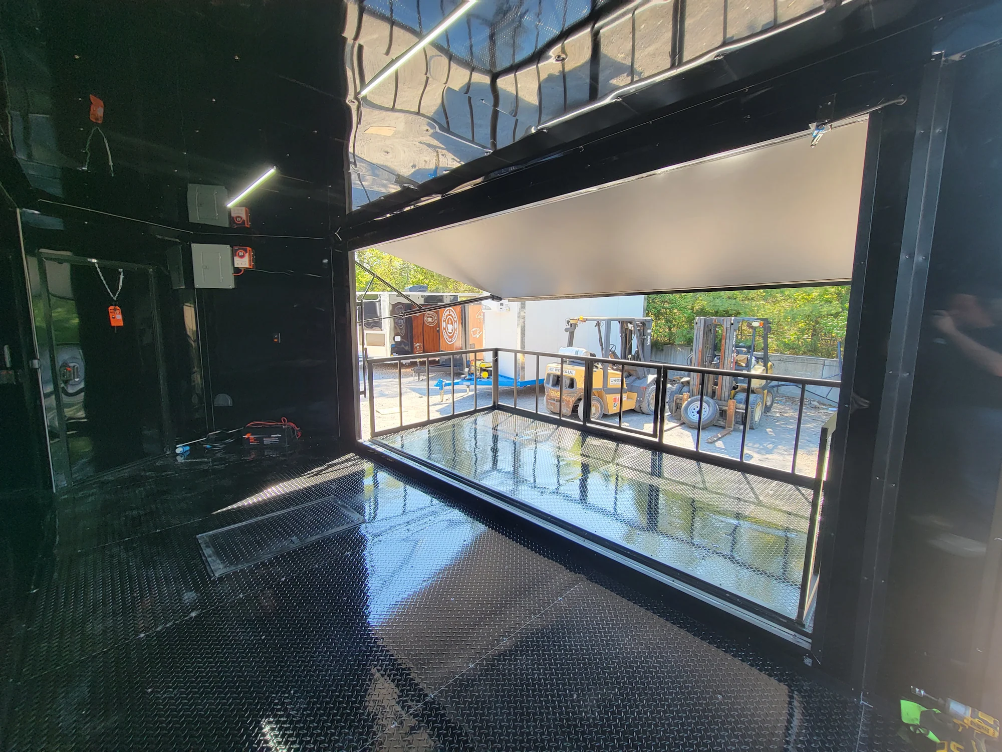 8.5' X 18' Custom Enclosed Stage and Event Deck over Blackout With Black Trim