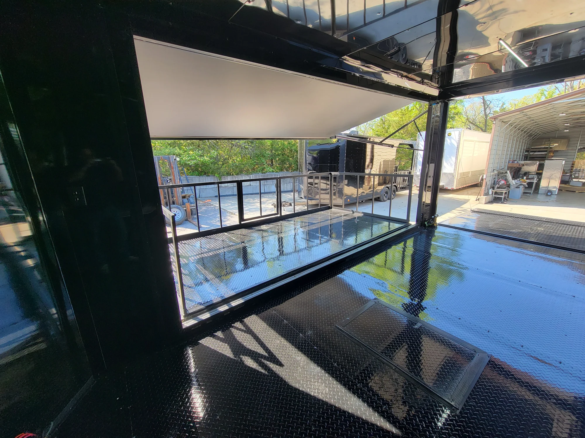 8.5' X 18' Custom Enclosed Stage and Event Deck over Blackout With Black Trim
