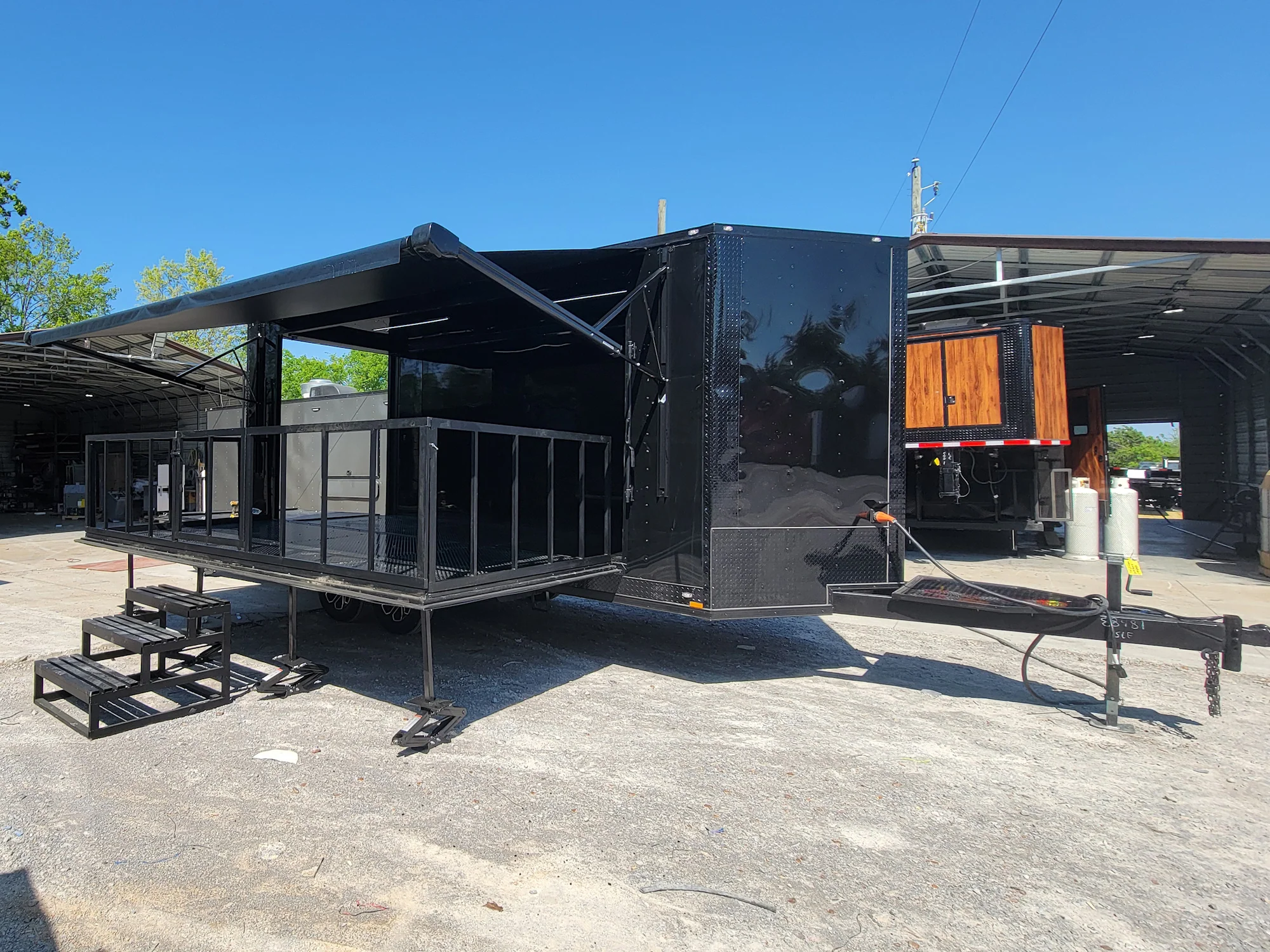 8.5' X 18' Custom Enclosed Stage and Event Deck over Blackout With Black Trim