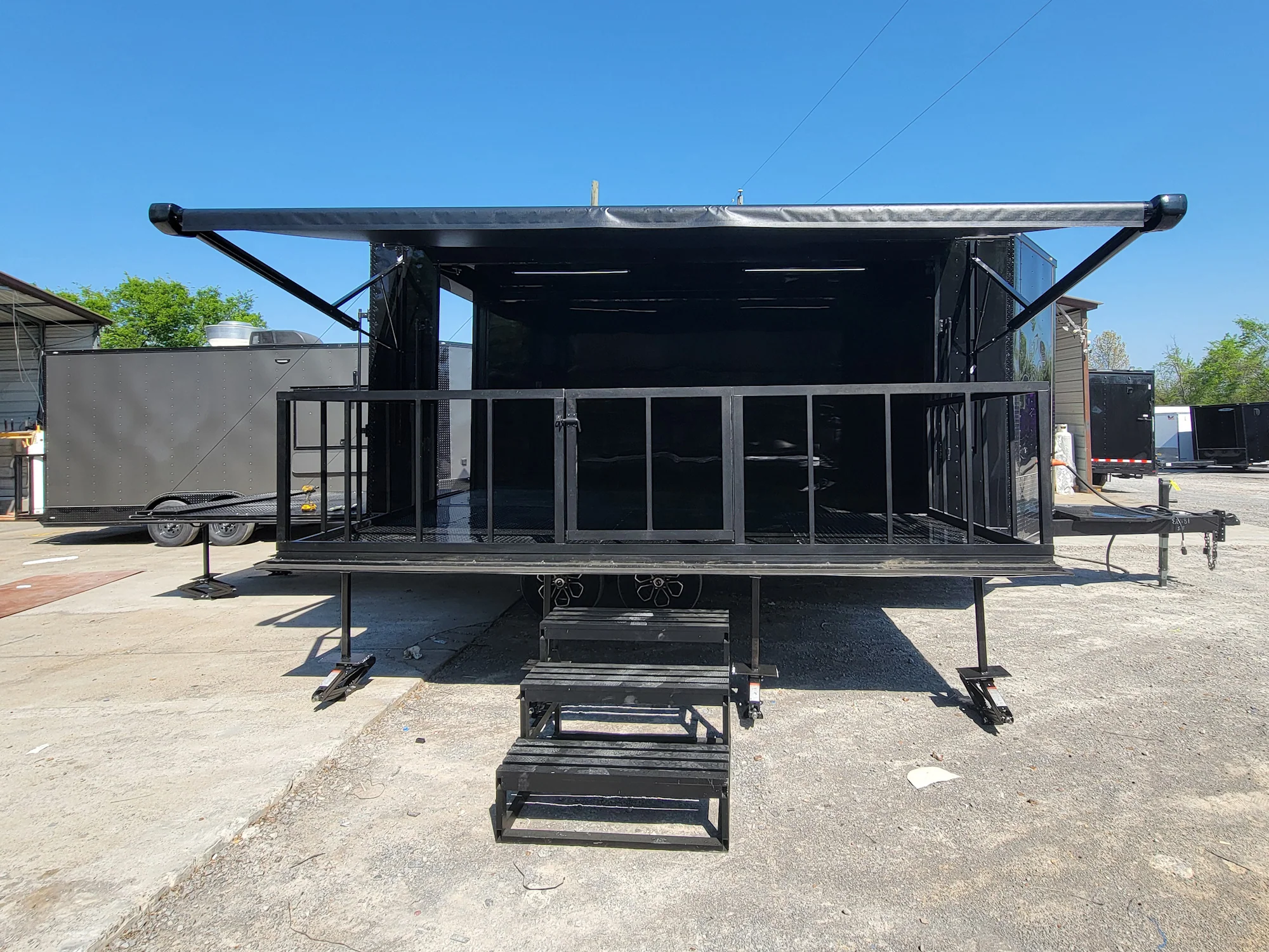 8.5' X 18' Custom Enclosed Stage and Event Deck over Blackout With Black Trim