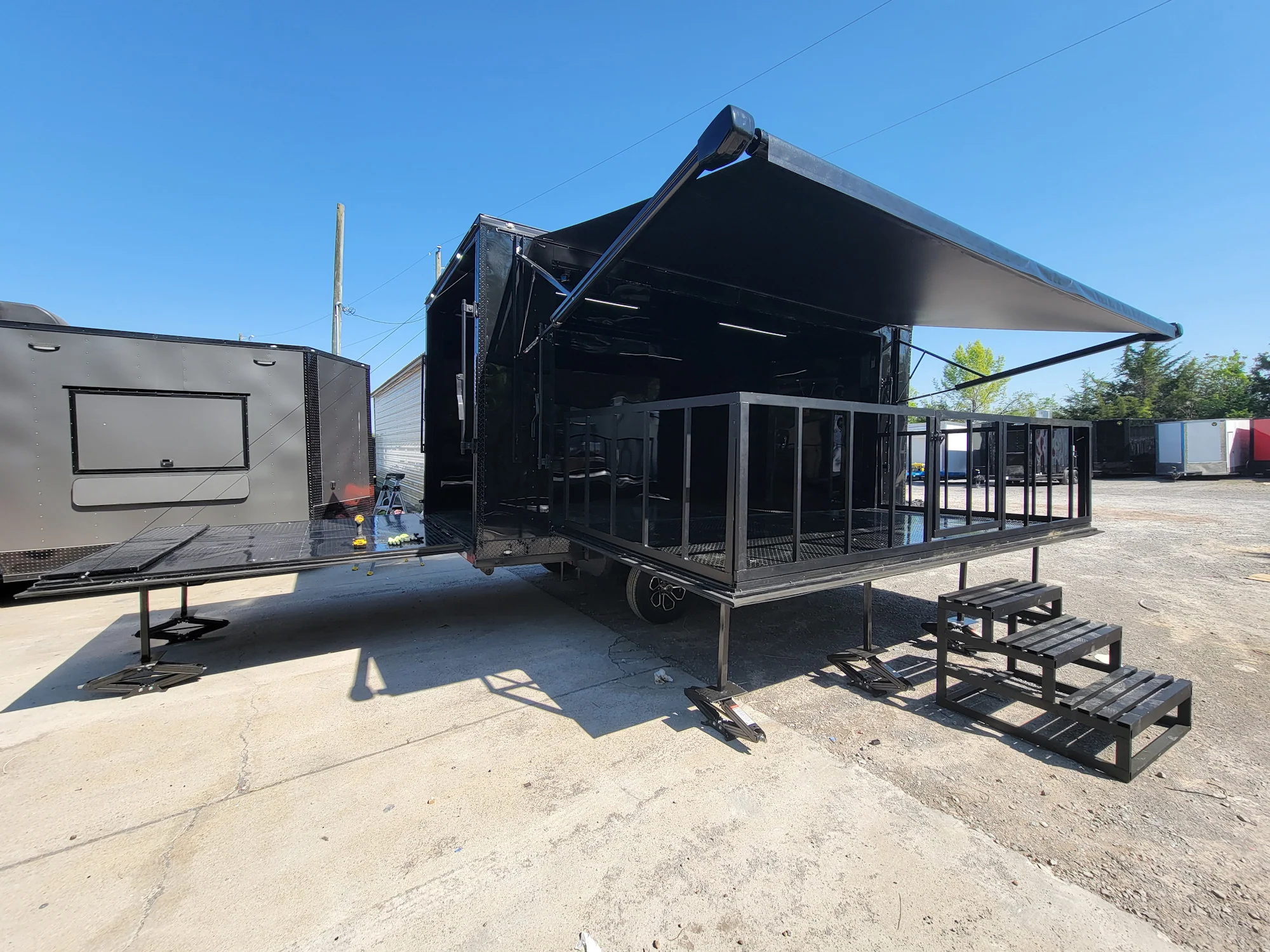 8.5' X 18' Custom Enclosed Stage and Event Deck over Blackout With Black Trim