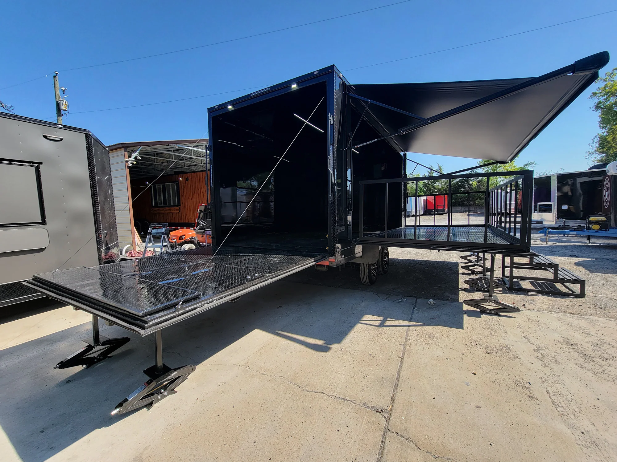 8.5' X 18' Custom Enclosed Stage and Event Deck over Blackout With Black Trim
