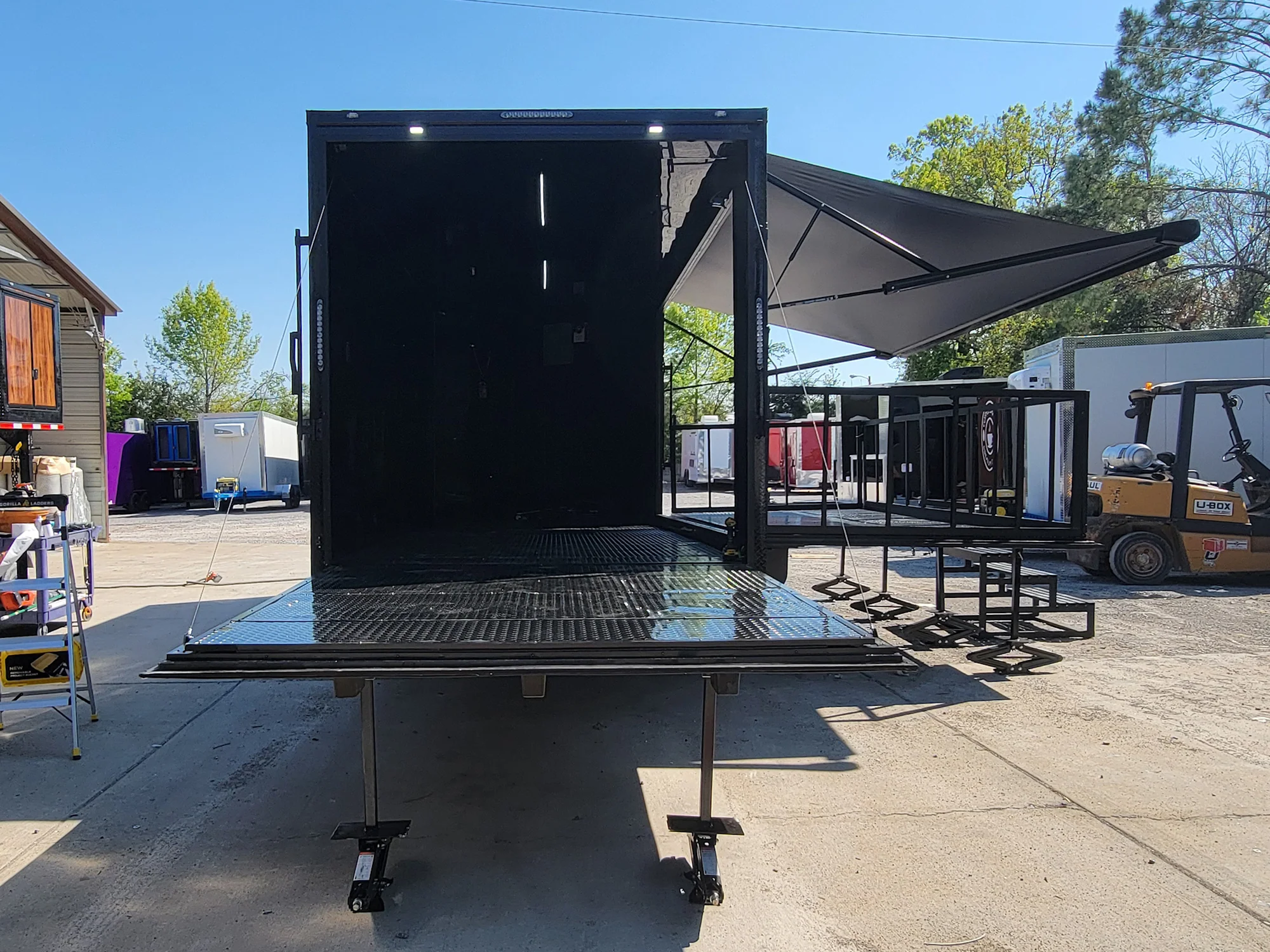 8.5' X 18' Custom Enclosed Stage and Event Deck over Blackout With Black Trim