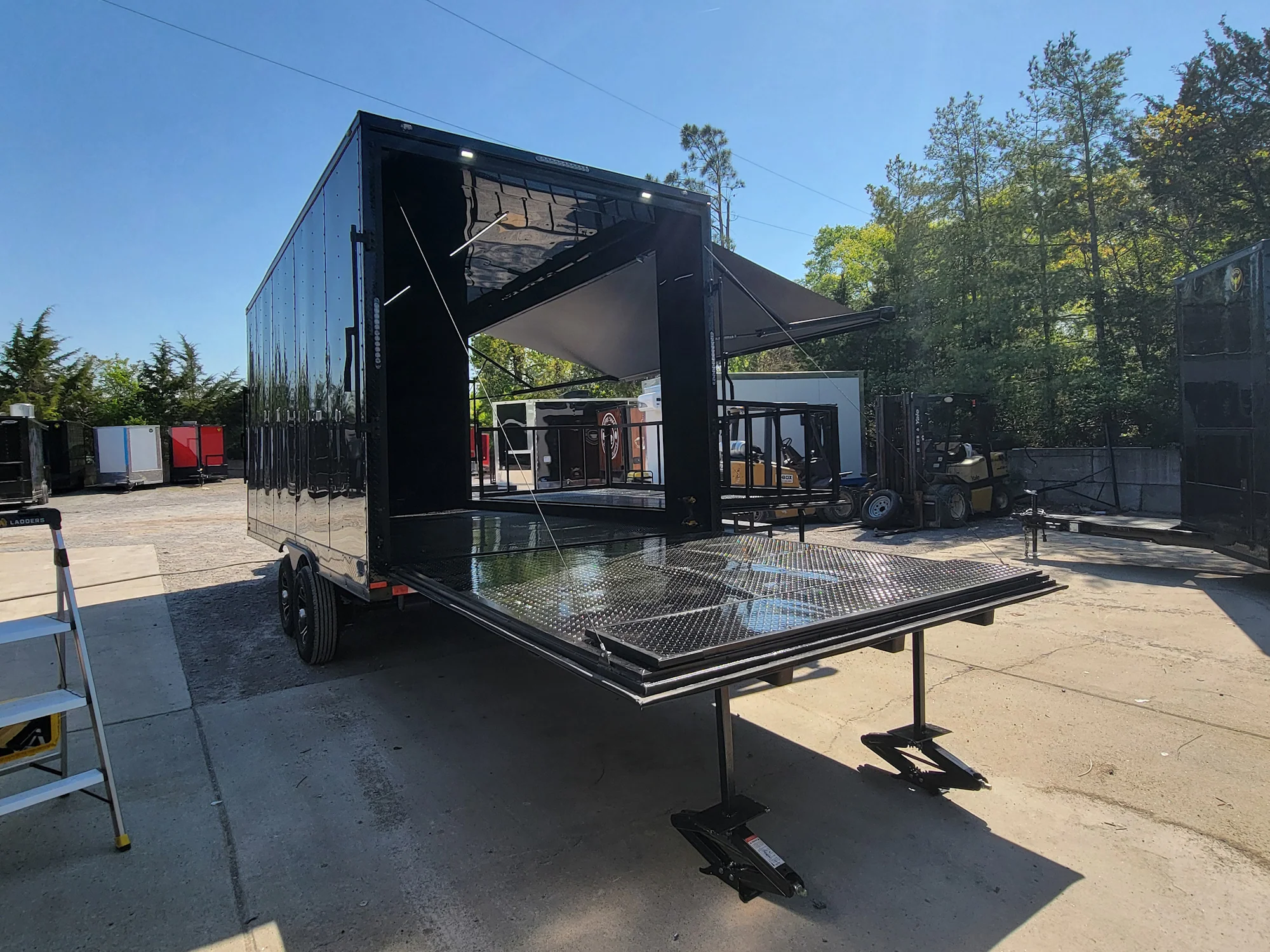 8.5' X 18' Custom Enclosed Stage and Event Deck over Blackout With Black Trim