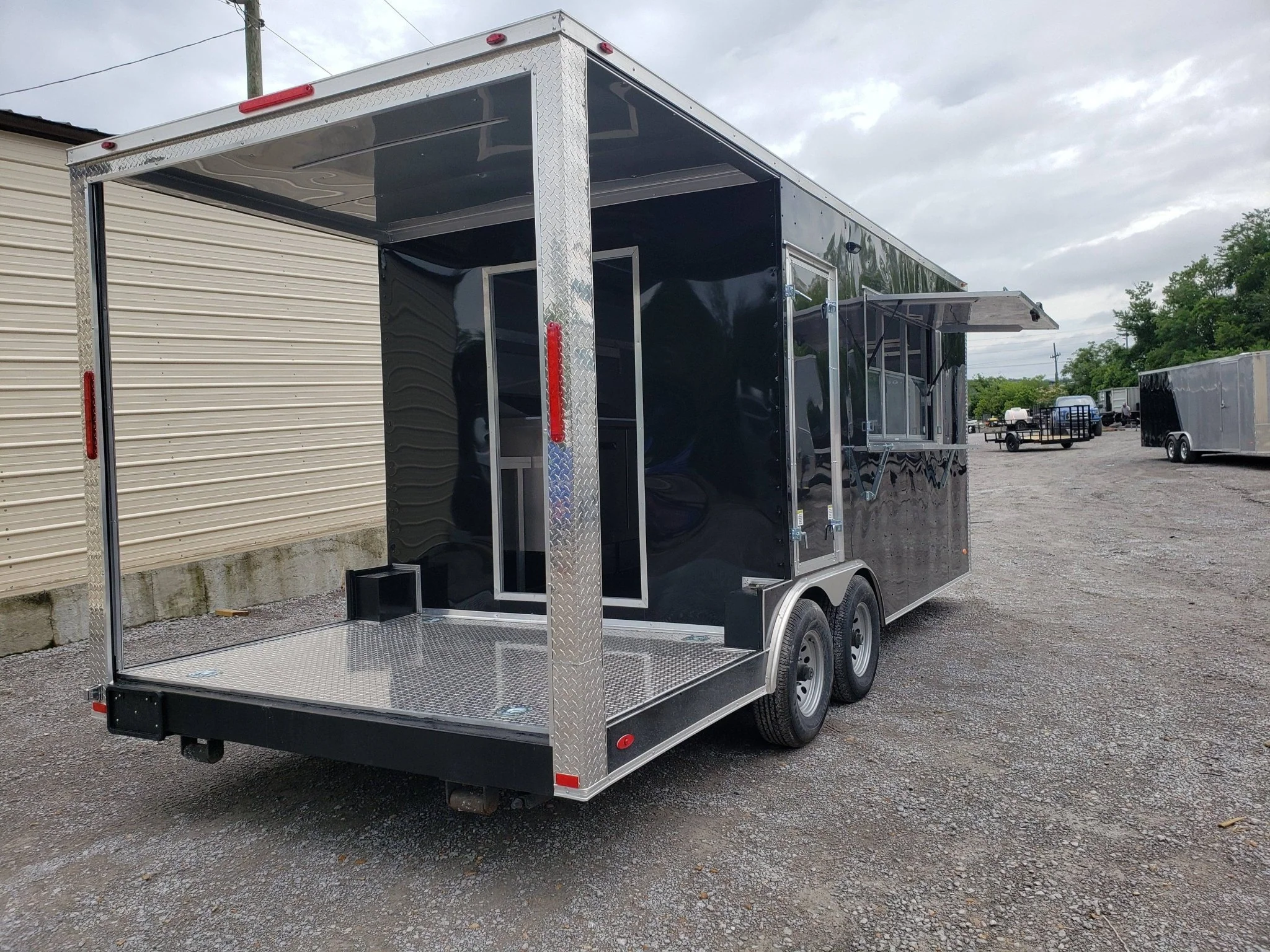 351-8.5-x-20-black-pizza-vending-concession-food-trailer-3.webp 8.5' x 20' Black Pizza Vending Concession Food Trailer