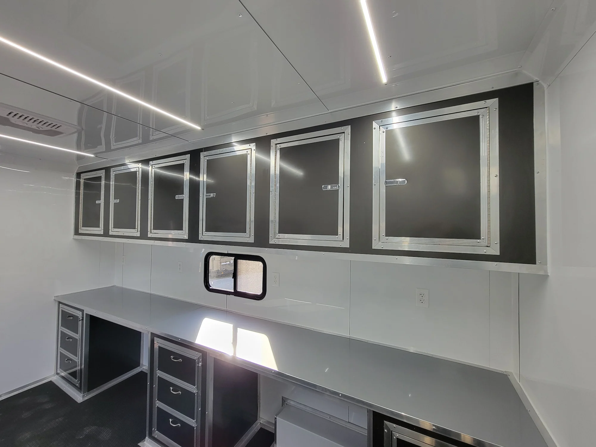 432-8.5-x-20-custom-enclosed-trailer-charcoal-with-blackout-office-and-mobile-command-19.webp 8.5' X 20' Custom Enclosed Trailer Charcoal With Blackout Office and Mobile Command