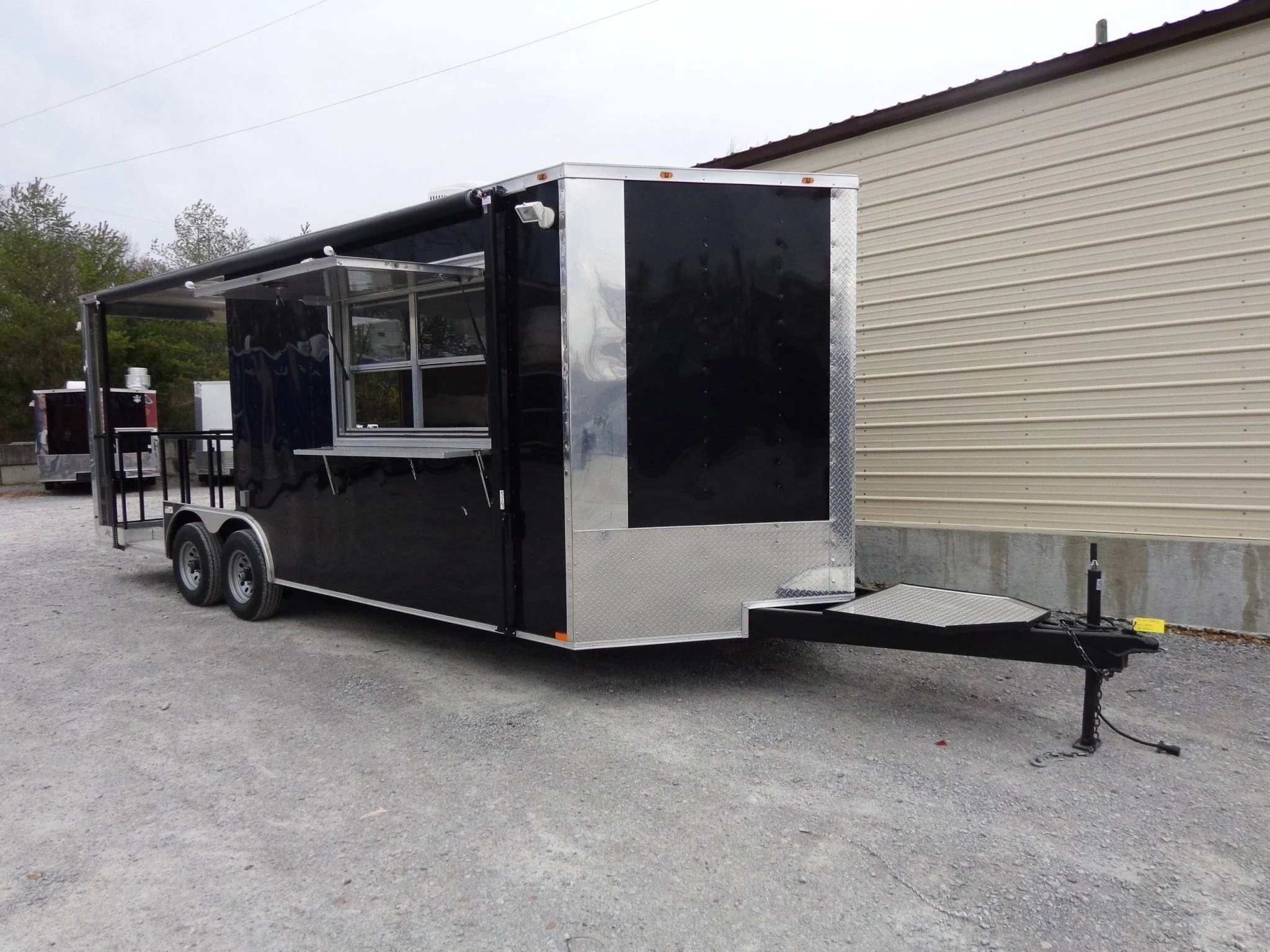 517-8.5-x-22-black-bbq-porch-style-concession-trailer-1.webp 8.5' x 22' Black BBQ Porch Style Concession Trailer