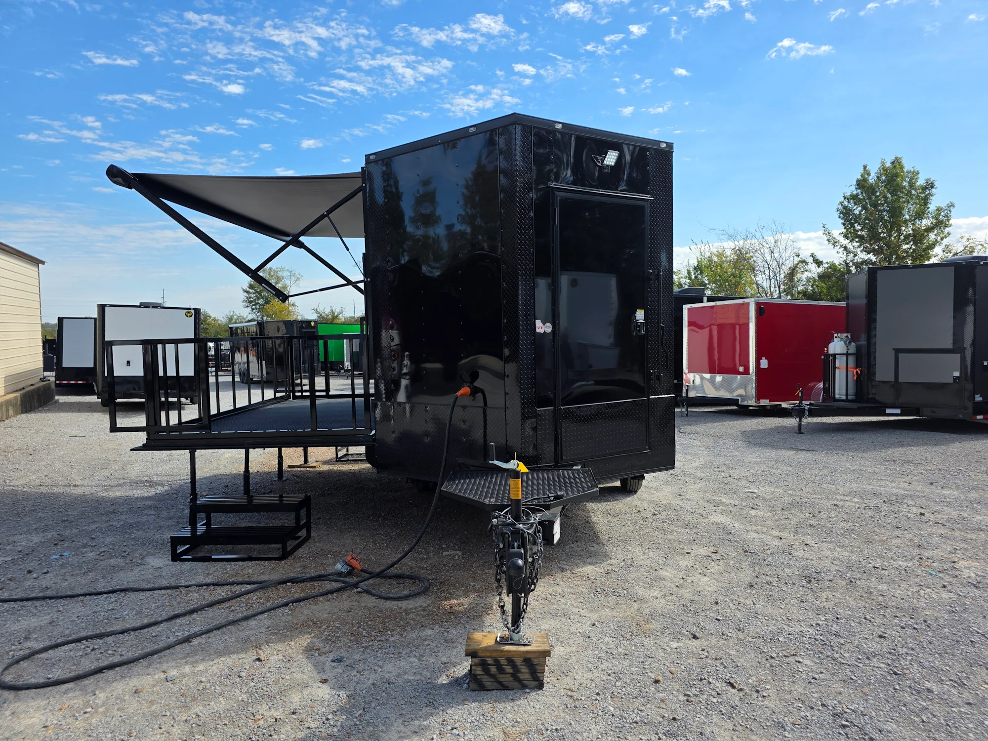 52-8.5-x-14-black-with-blackout-custom-stage-trailer-2.webp 8.5' X 14' Black With Blackout Custom Stage Trailer