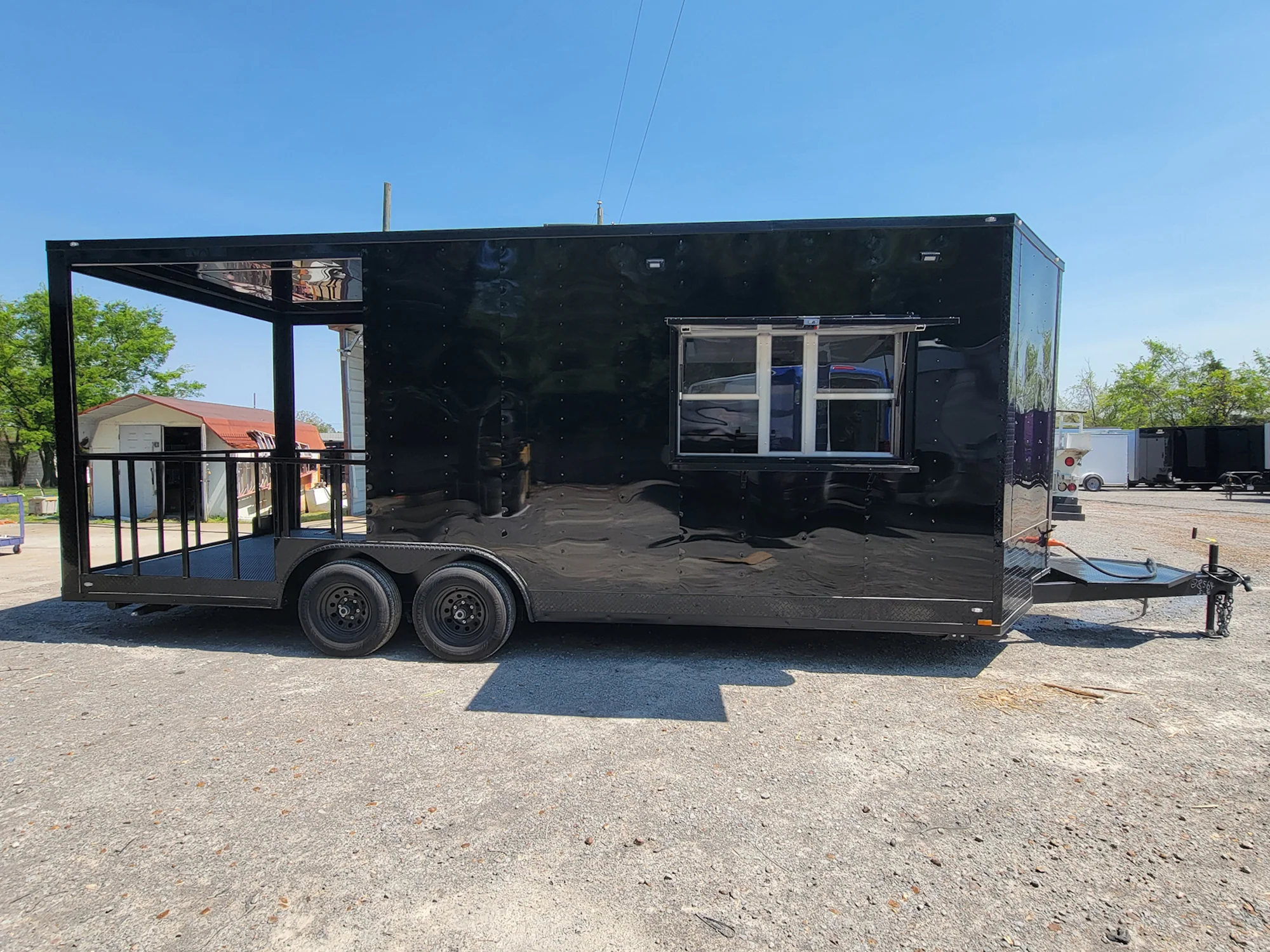 561-8.5-x-22-concession-trailer-black-with-blackout-trim-8ft-bbq-porch-1.webp 8.5' X 22' Concession Trailer Black With Blackout Trim 8ft BBQ Porch
