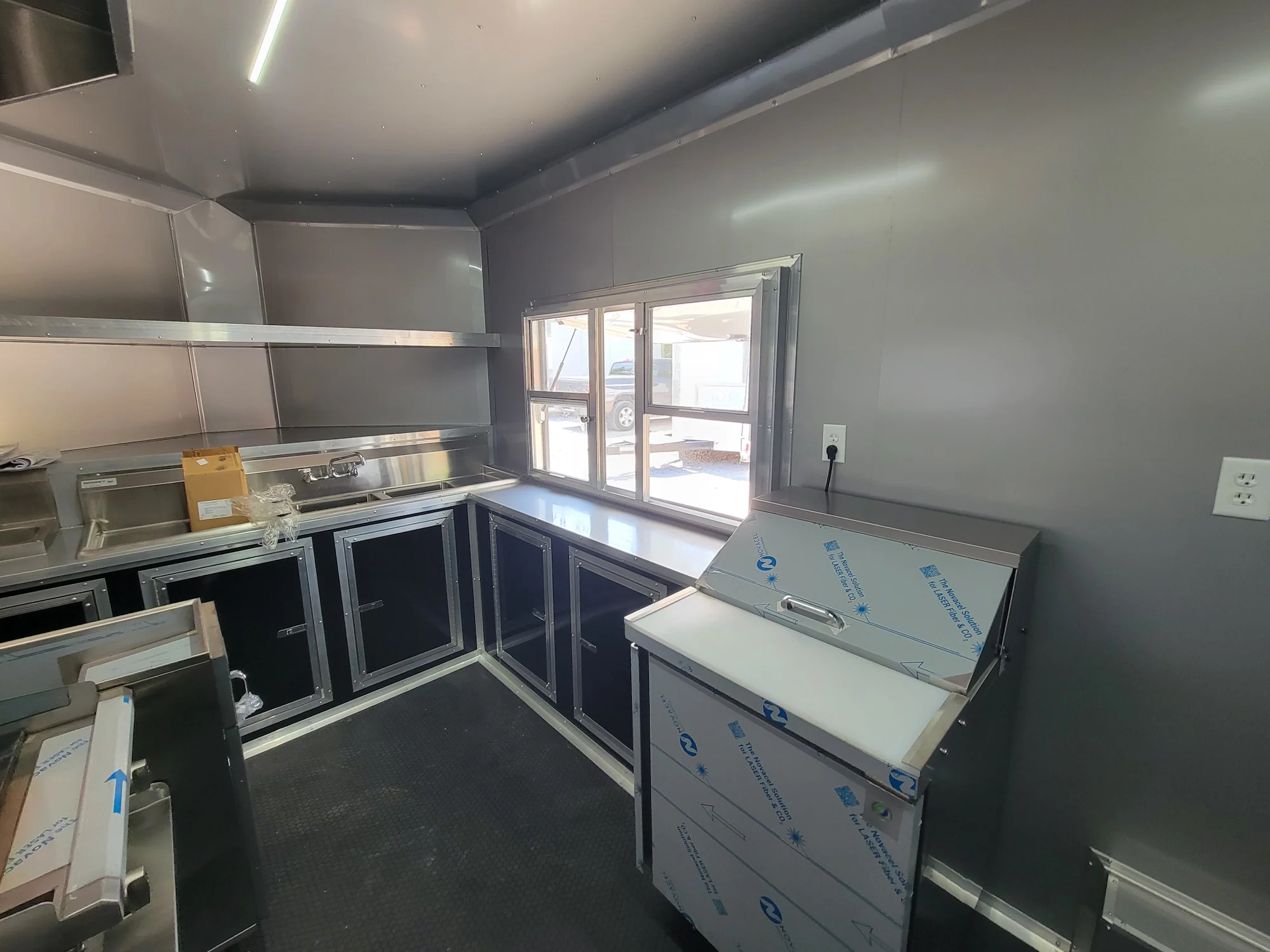 561-8.5-x-22-concession-trailer-black-with-blackout-trim-8ft-bbq-porch-5.webp 8.5' X 22' Concession Trailer Black With Blackout Trim 8ft BBQ Porch