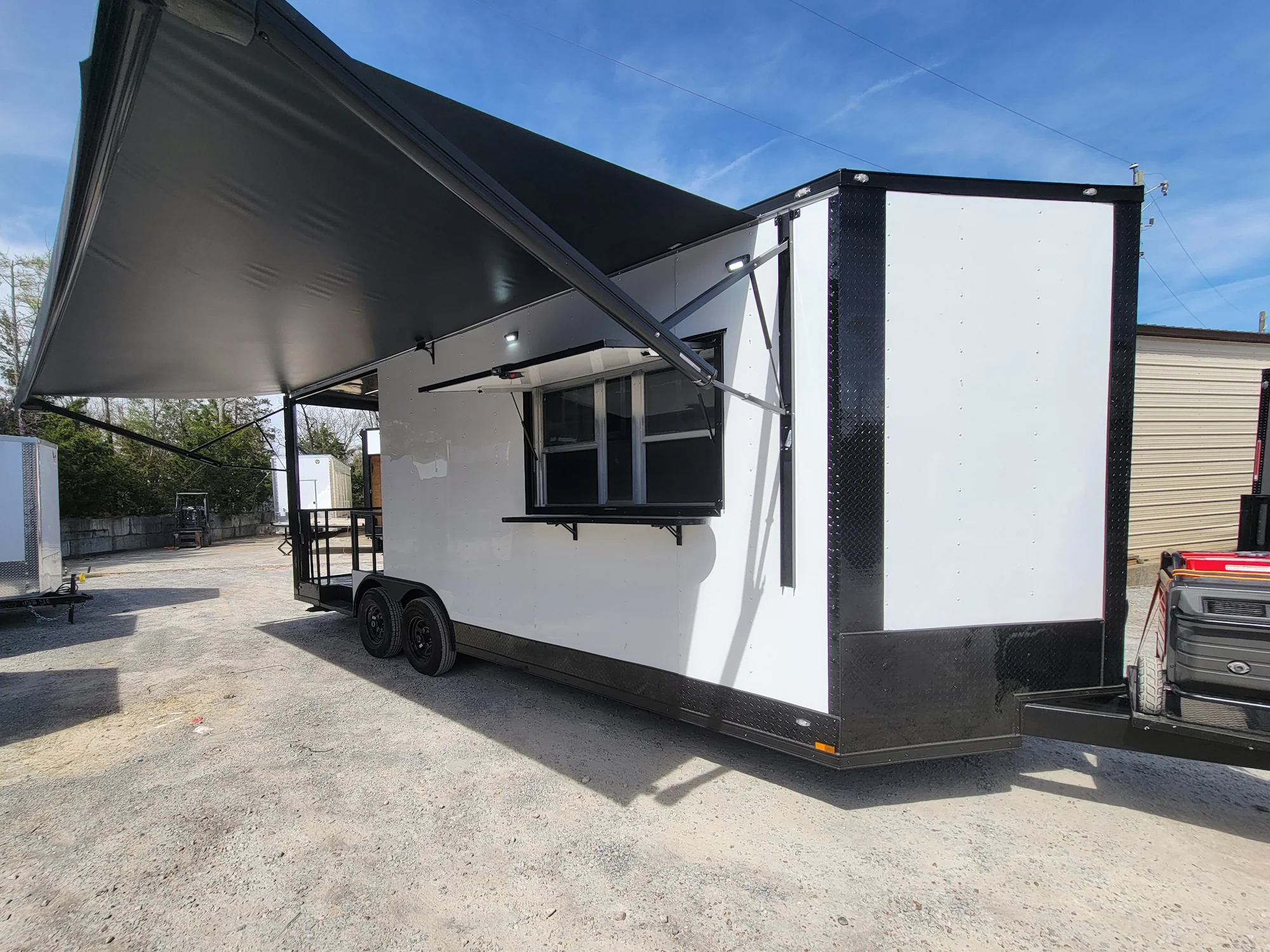 570-8.5-x-22-concession-trailer-with-8-porch-white-with-blackout-trim-bbq-food-event-catering-4.webp 8.5' X 22' Concession Trailer With 8' Porch White With Blackout Trim BBQ Food Event Catering