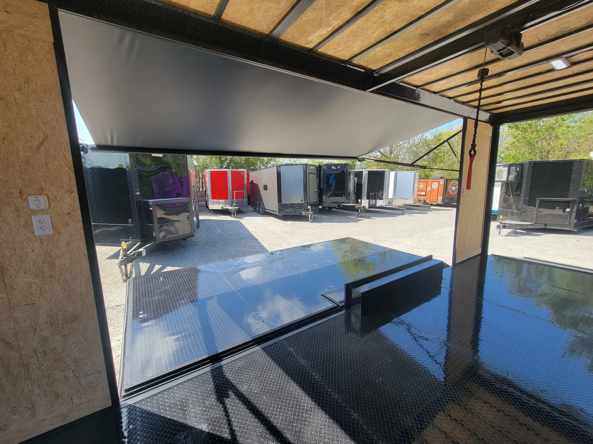 644-8.5-x-24-black-with-blackout-custom-stage-trailer-10.webp 8.5' X 24' Black With Blackout Custom Stage Trailer