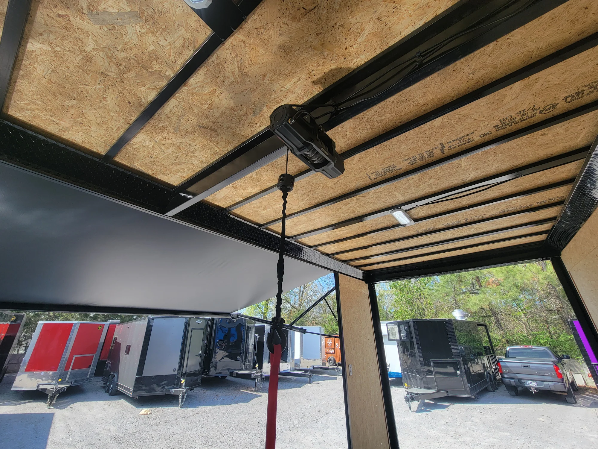 644-8.5-x-24-black-with-blackout-custom-stage-trailer-11.webp 8.5' X 24' Black With Blackout Custom Stage Trailer