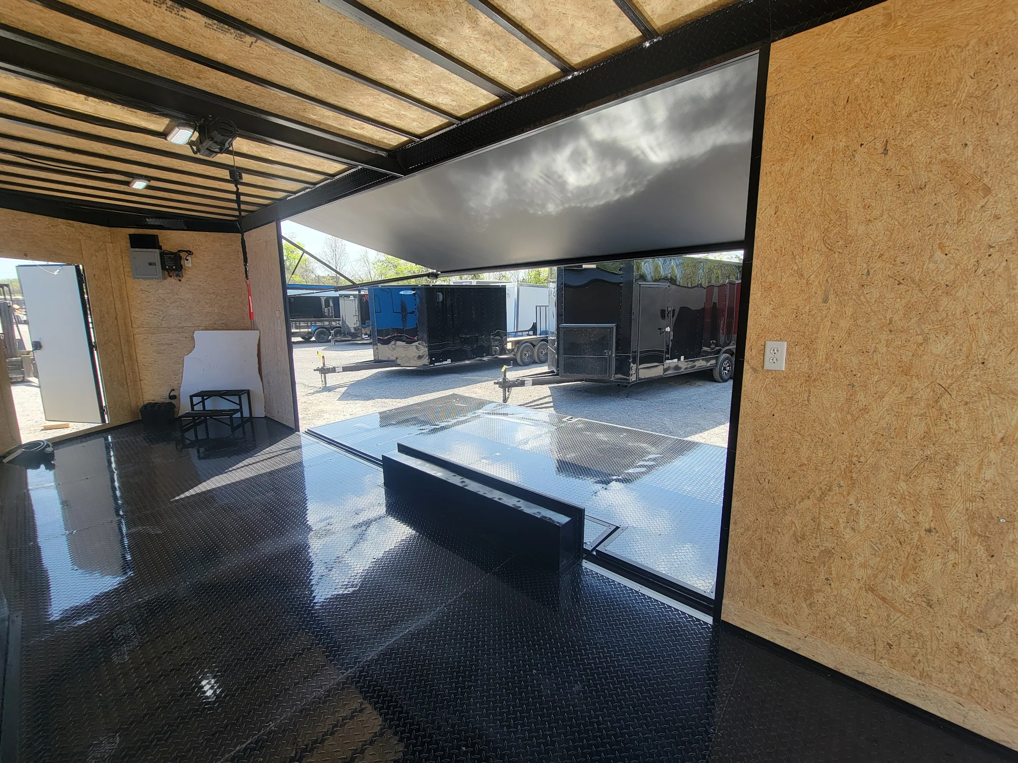 644-8.5-x-24-black-with-blackout-custom-stage-trailer-12.webp 8.5' X 24' Black With Blackout Custom Stage Trailer