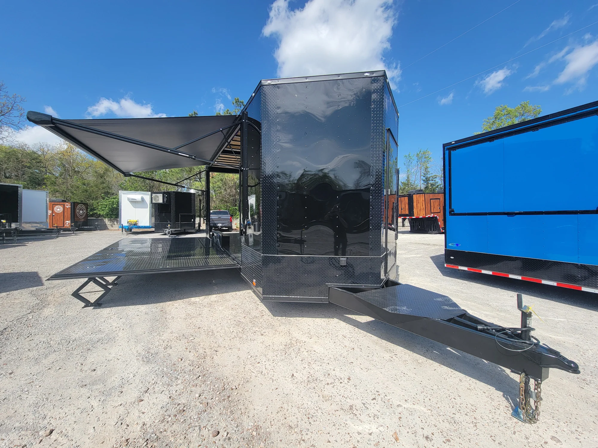 644-8.5-x-24-black-with-blackout-custom-stage-trailer-2.webp 8.5' X 24' Black With Blackout Custom Stage Trailer