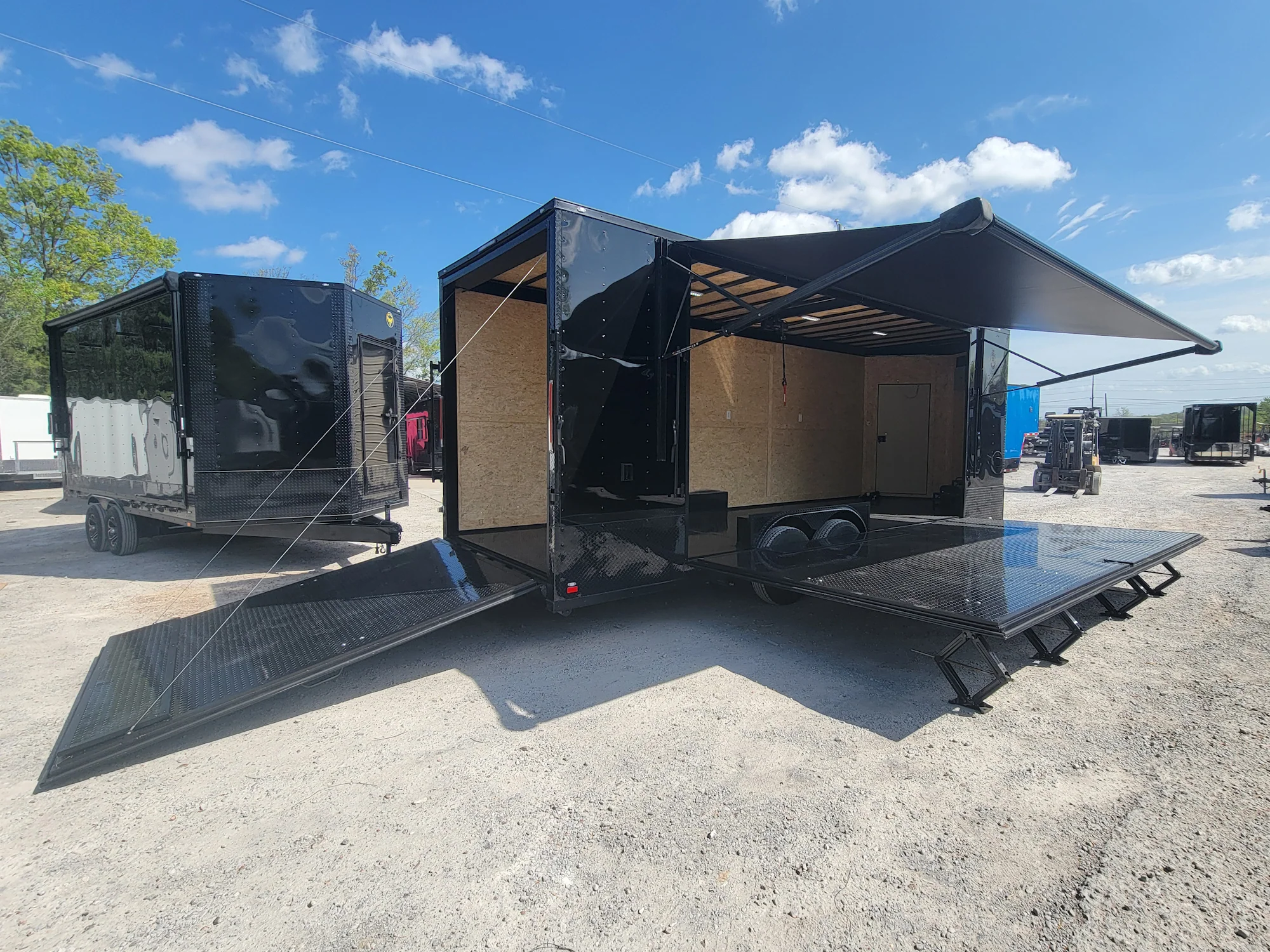 644-8.5-x-24-black-with-blackout-custom-stage-trailer-5.webp 8.5' X 24' Black With Blackout Custom Stage Trailer