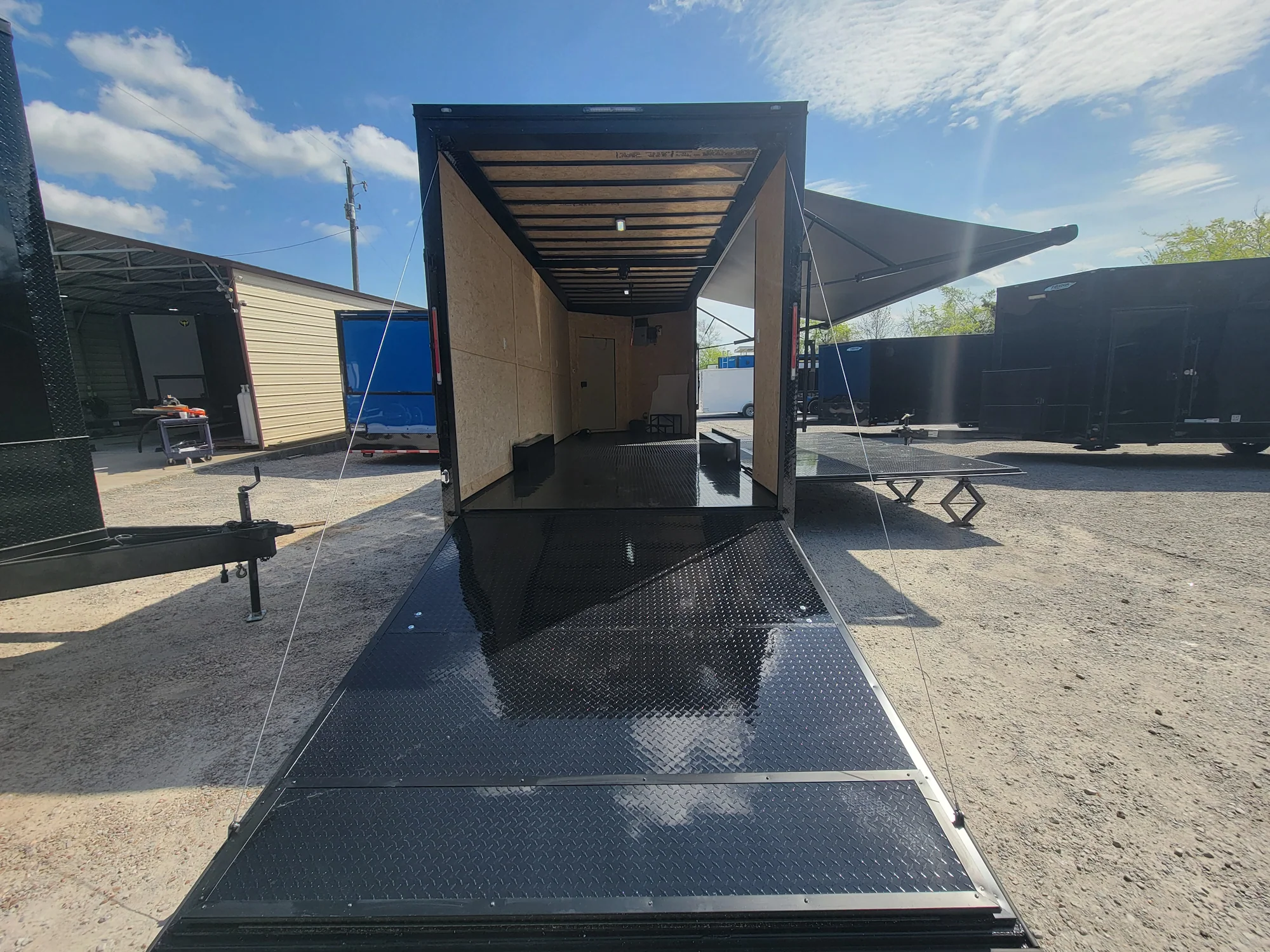 644-8.5-x-24-black-with-blackout-custom-stage-trailer-6.webp 8.5' X 24' Black With Blackout Custom Stage Trailer