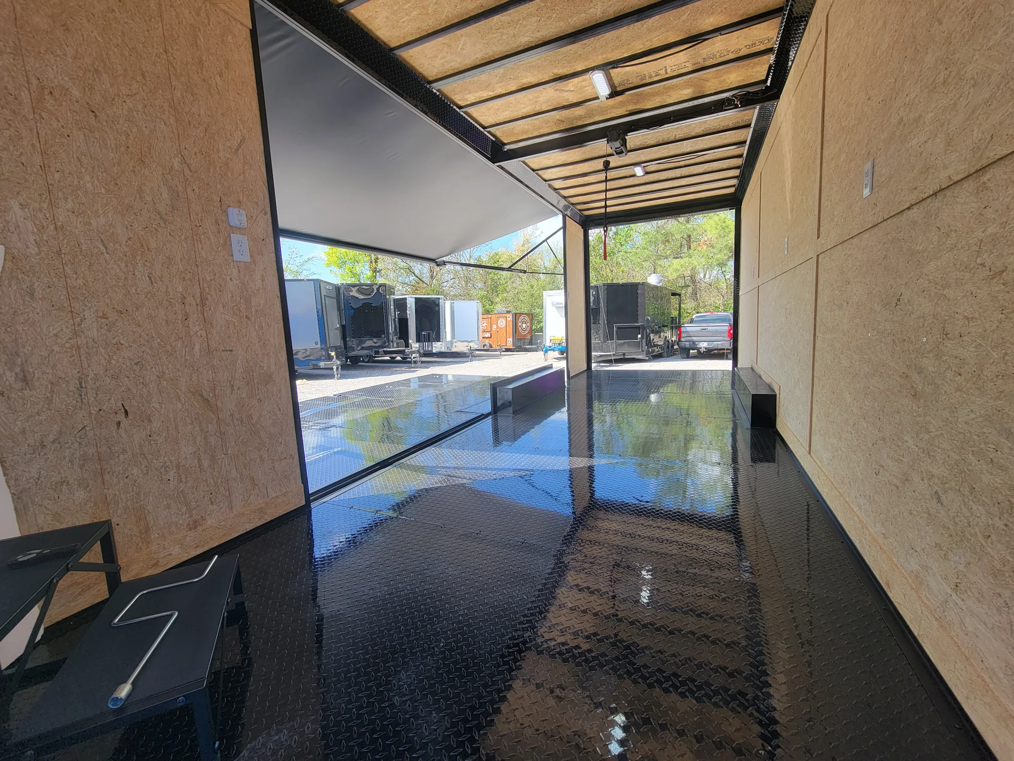 644-8.5-x-24-black-with-blackout-custom-stage-trailer-9.webp 8.5' X 24' Black With Blackout Custom Stage Trailer