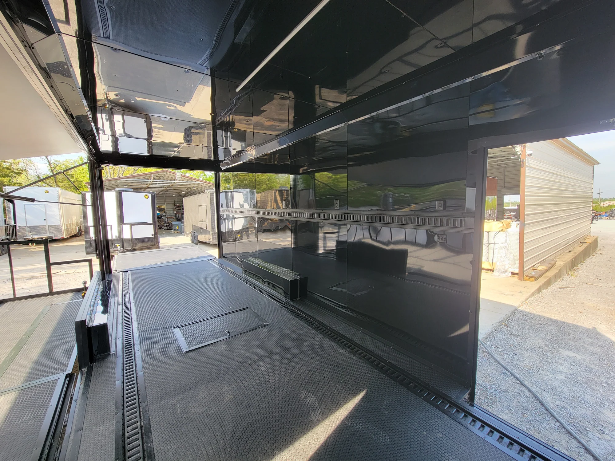 645-8.5-x-24-black-with-blackout-stage-trailer-with-awning-semi-screwless-exterior-12.webp 8.5' X 24' Black With Blackout Stage Trailer With Awning Semi Screwless Exterior