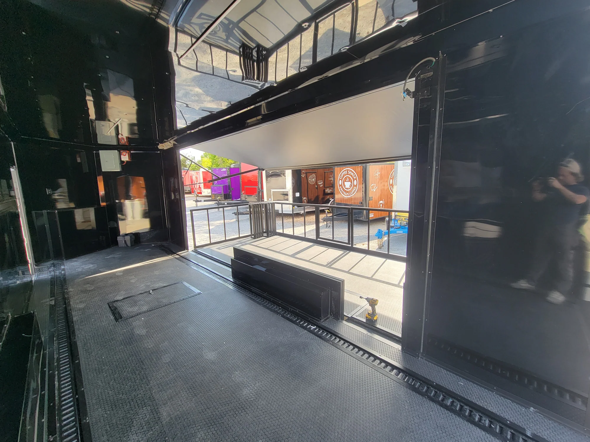 645-8.5-x-24-black-with-blackout-stage-trailer-with-awning-semi-screwless-exterior-14.webp 8.5' X 24' Black With Blackout Stage Trailer With Awning Semi Screwless Exterior