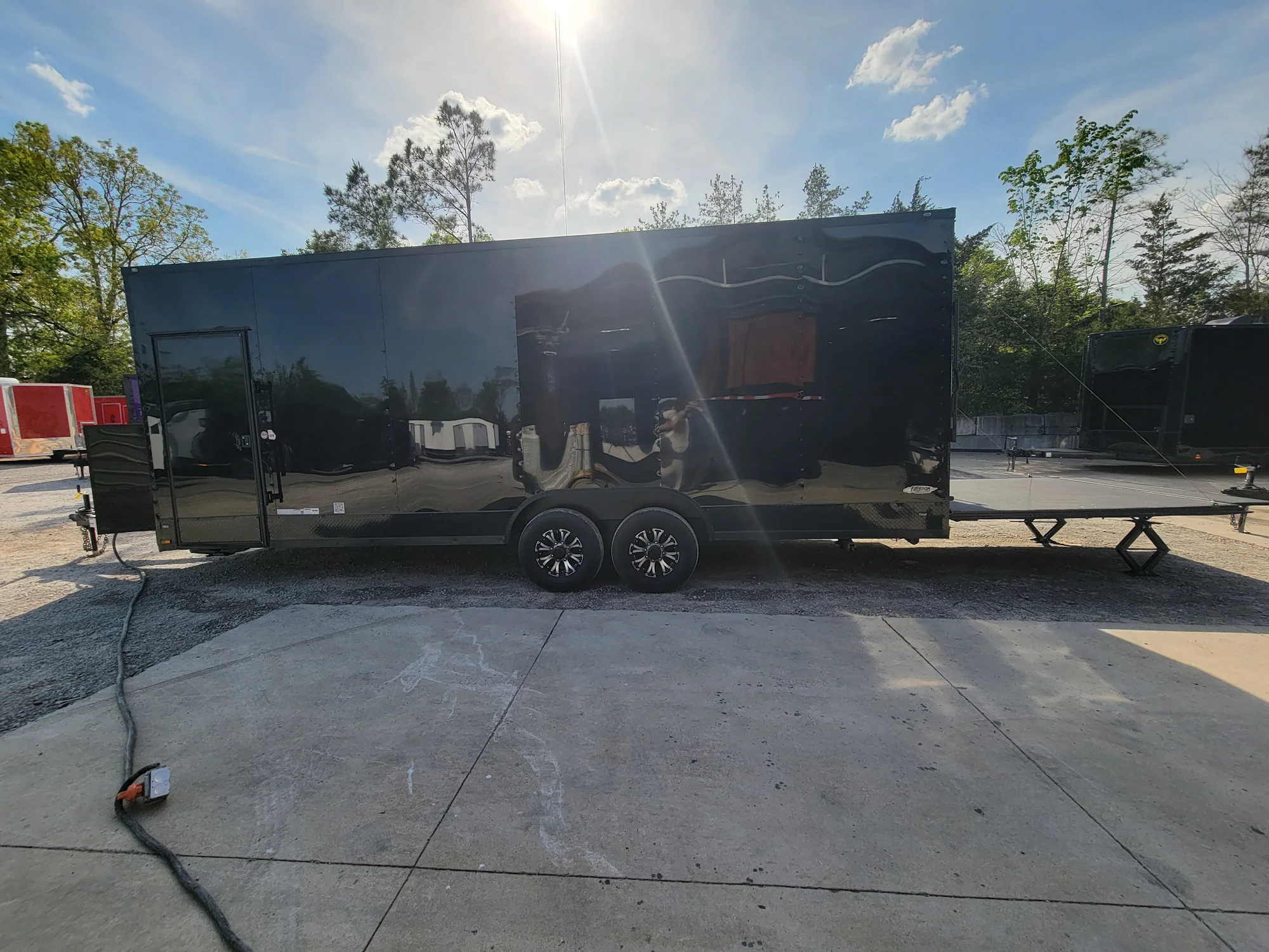 645-8.5-x-24-black-with-blackout-stage-trailer-with-awning-semi-screwless-exterior-9.webp 8.5' X 24' Black With Blackout Stage Trailer With Awning Semi Screwless Exterior