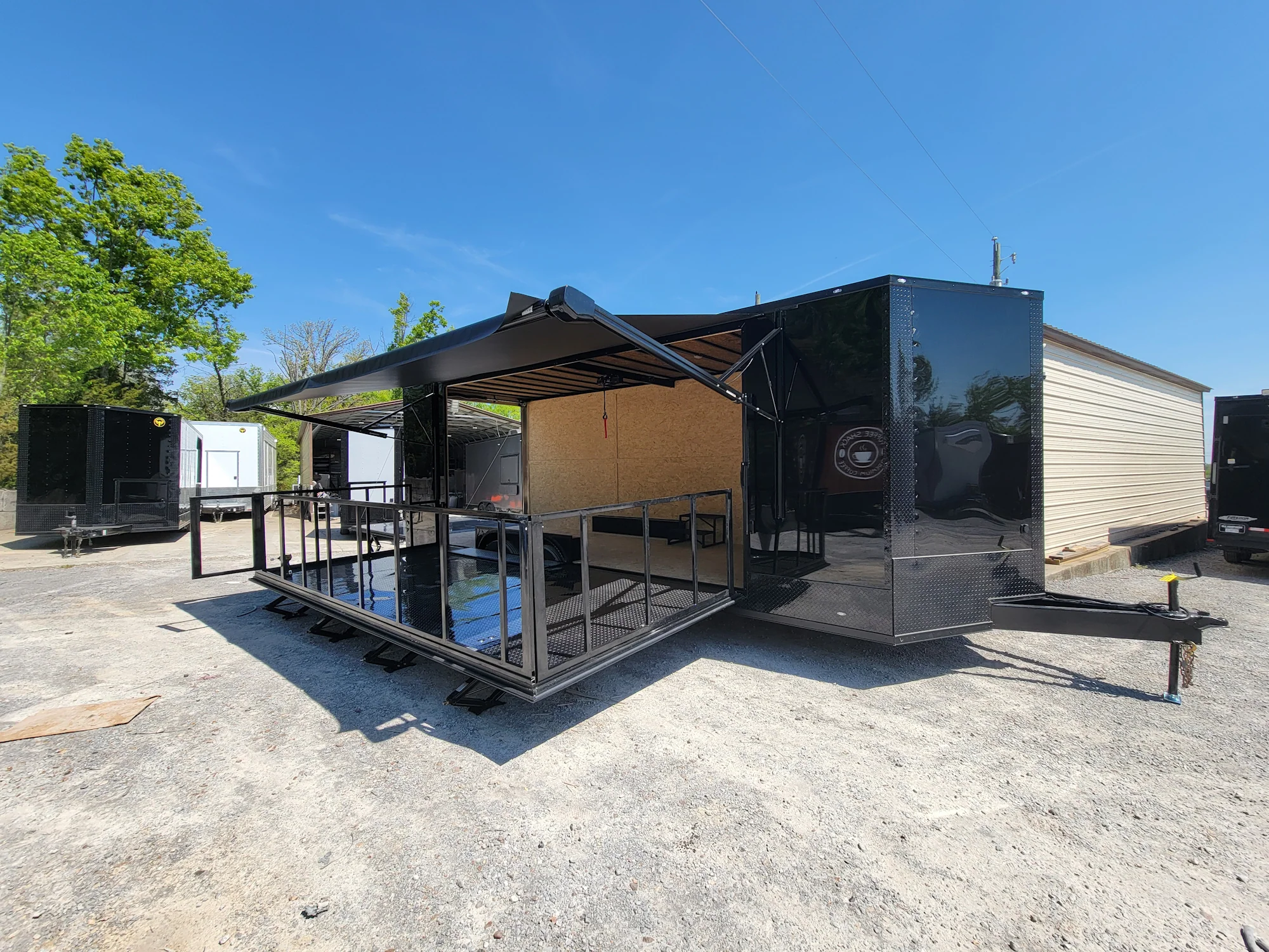 718-8.5-x-24-custom-enclosed-stage-trailer-black-with-black-out-trim-and-awning-1.webp 8.5' X 24' Custom Enclosed Stage Trailer Black With Black Out Trim and Awning