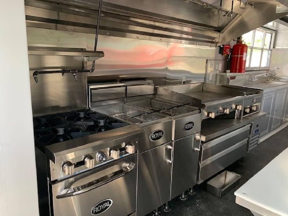 8.5' x 24' Penske Yellow Concession Food Trailer with Restroom