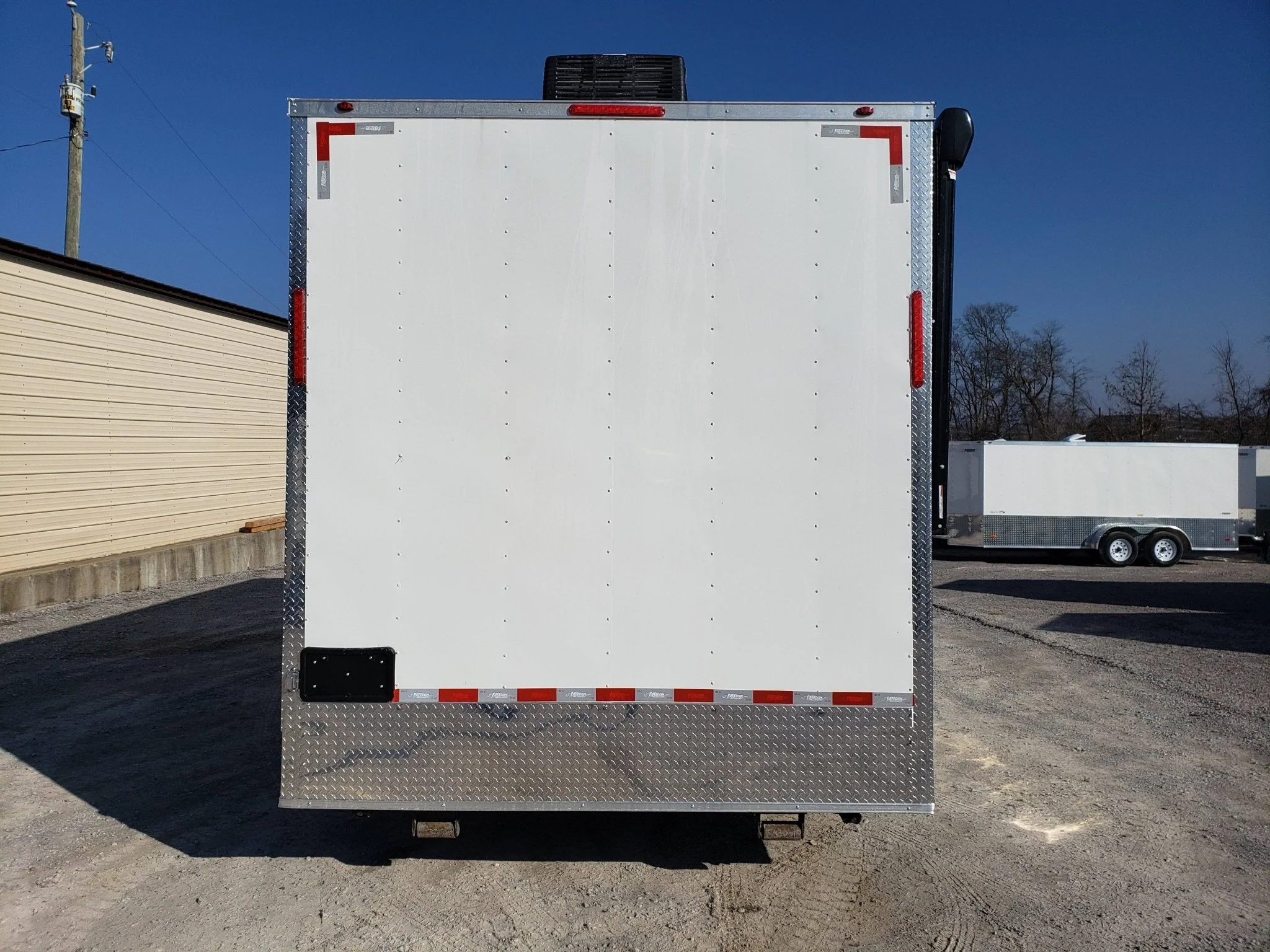 770-8.5-x-24-white-stage-trailer-3.webp 8.5' x 24' White Stage Trailer