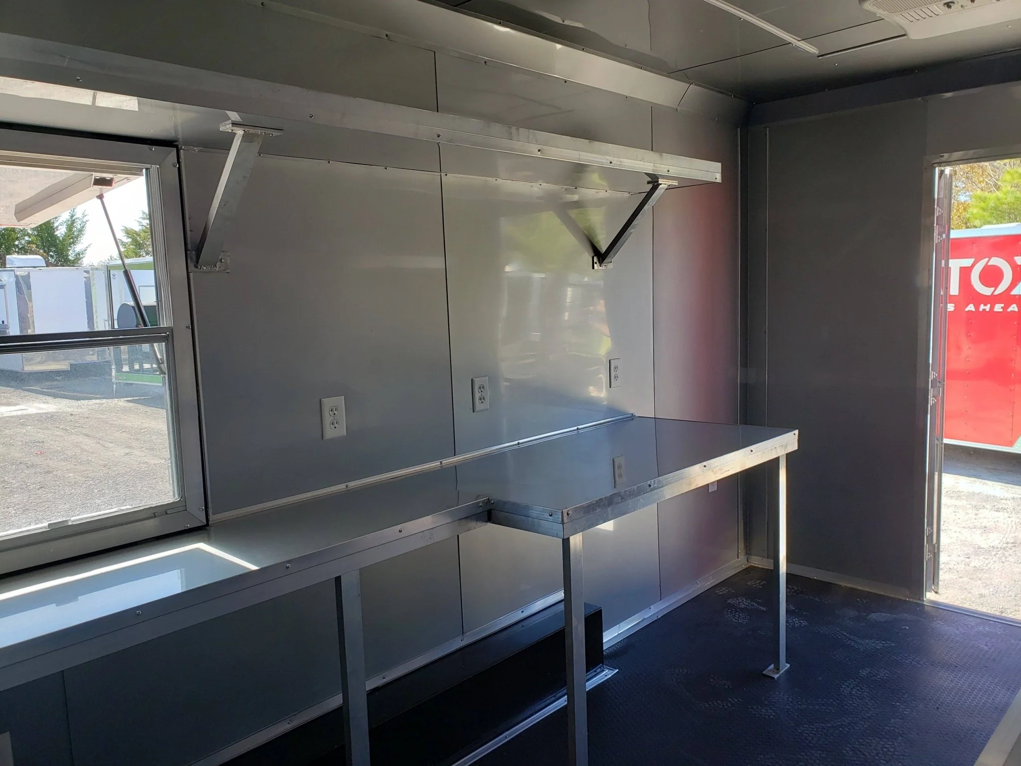 828-8.5-x-27-victory-red-gooseneck-concession-food-trailer-11.webp 8.5' x 27' Victory Red Gooseneck Concession Food Trailer
