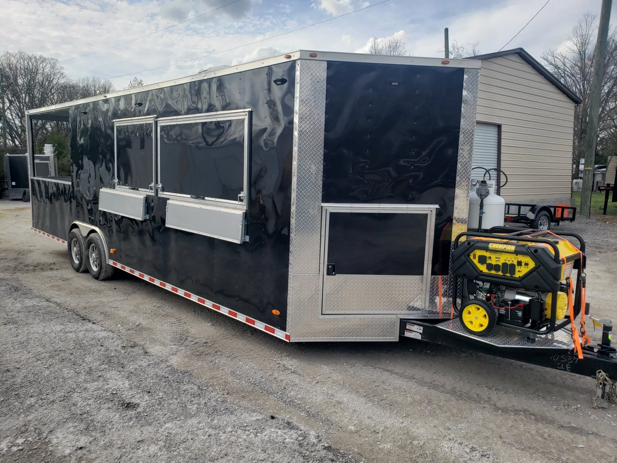 841-8.5-x-28-black-porch-style-bbq-vending-concession-trailer-1.webp 8.5' x 28' Black Porch Style BBQ Vending Concession Trailer