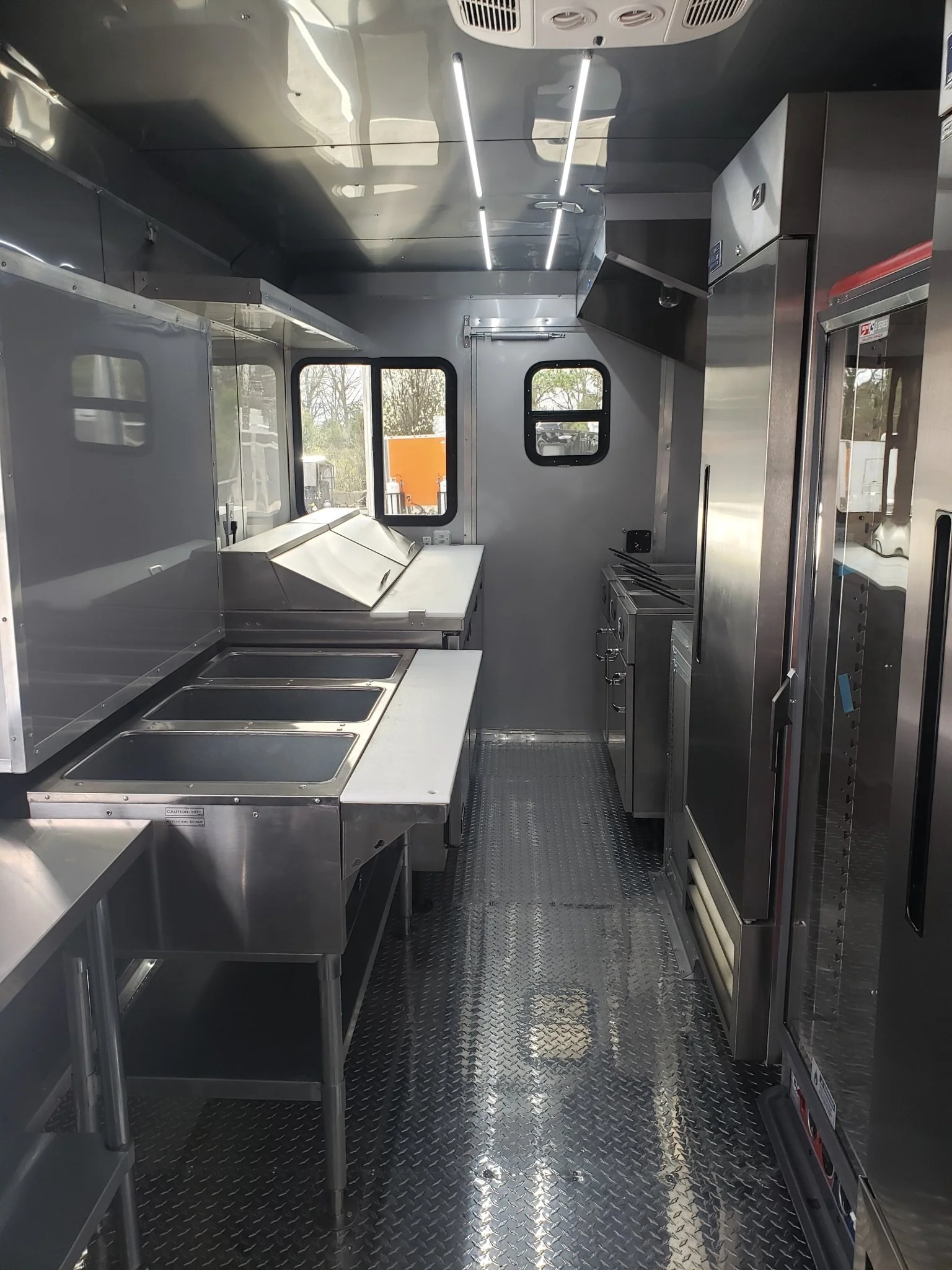 841-8.5-x-28-black-porch-style-bbq-vending-concession-trailer-29.webp 8.5' x 28' Black Porch Style BBQ Vending Concession Trailer