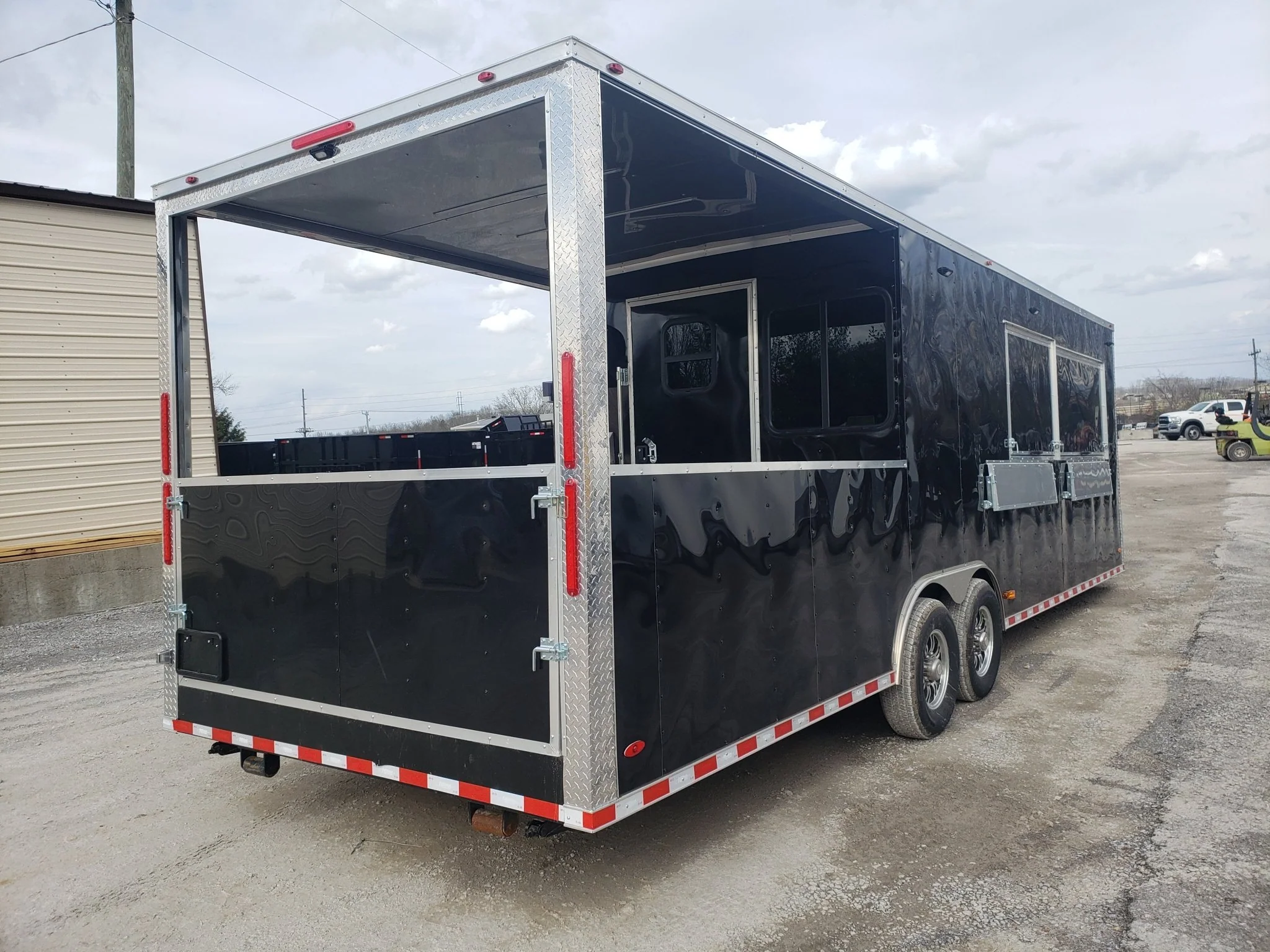 841-8.5-x-28-black-porch-style-bbq-vending-concession-trailer-3.webp 8.5' x 28' Black Porch Style BBQ Vending Concession Trailer