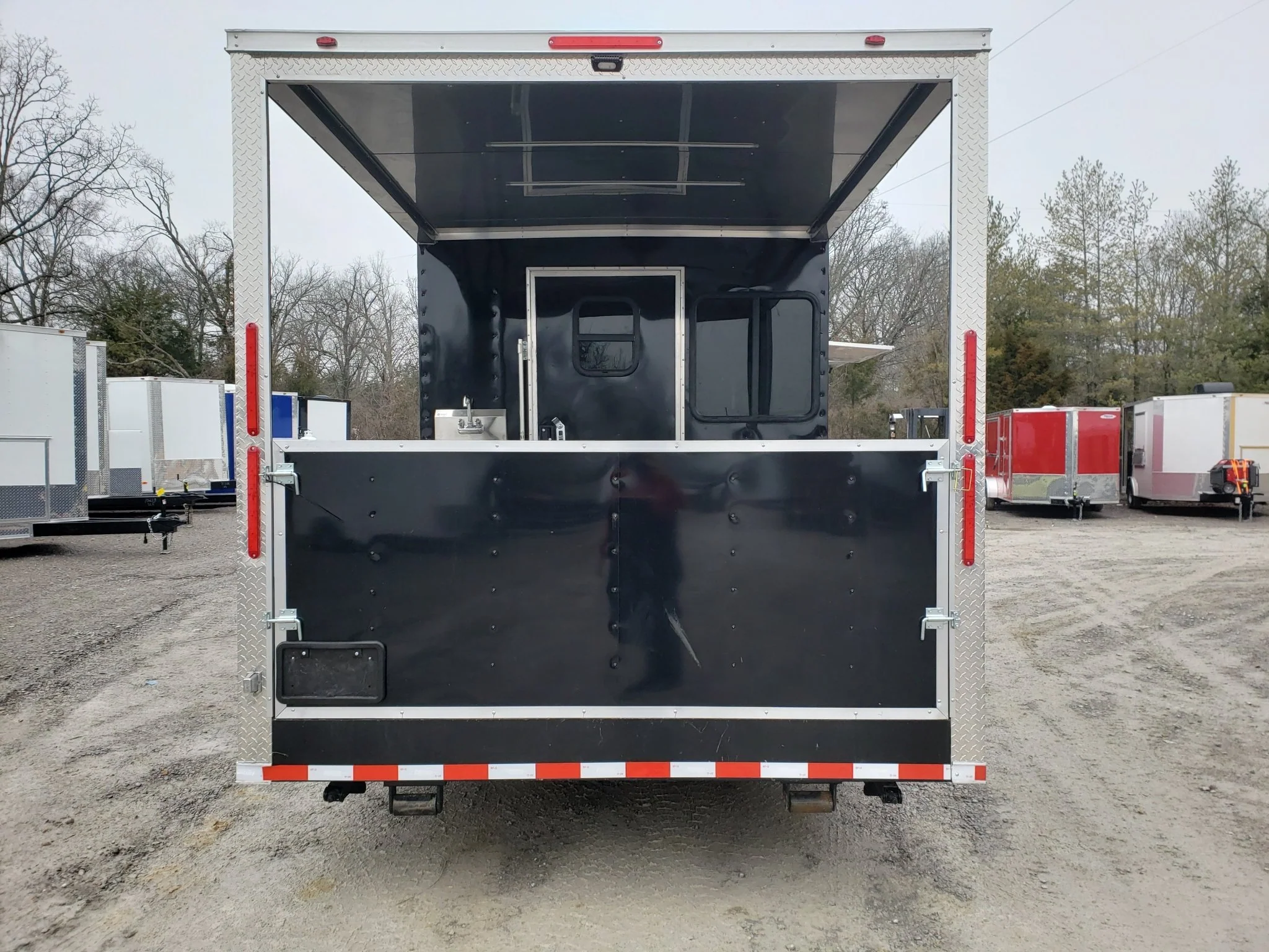 8.5' x 28' Black Porch Style BBQ Vending Concession Trailer