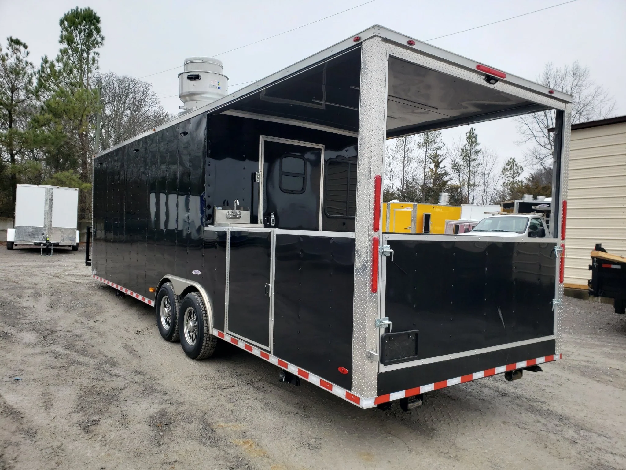 8.5' x 28' Black Porch Style BBQ Vending Concession Trailer