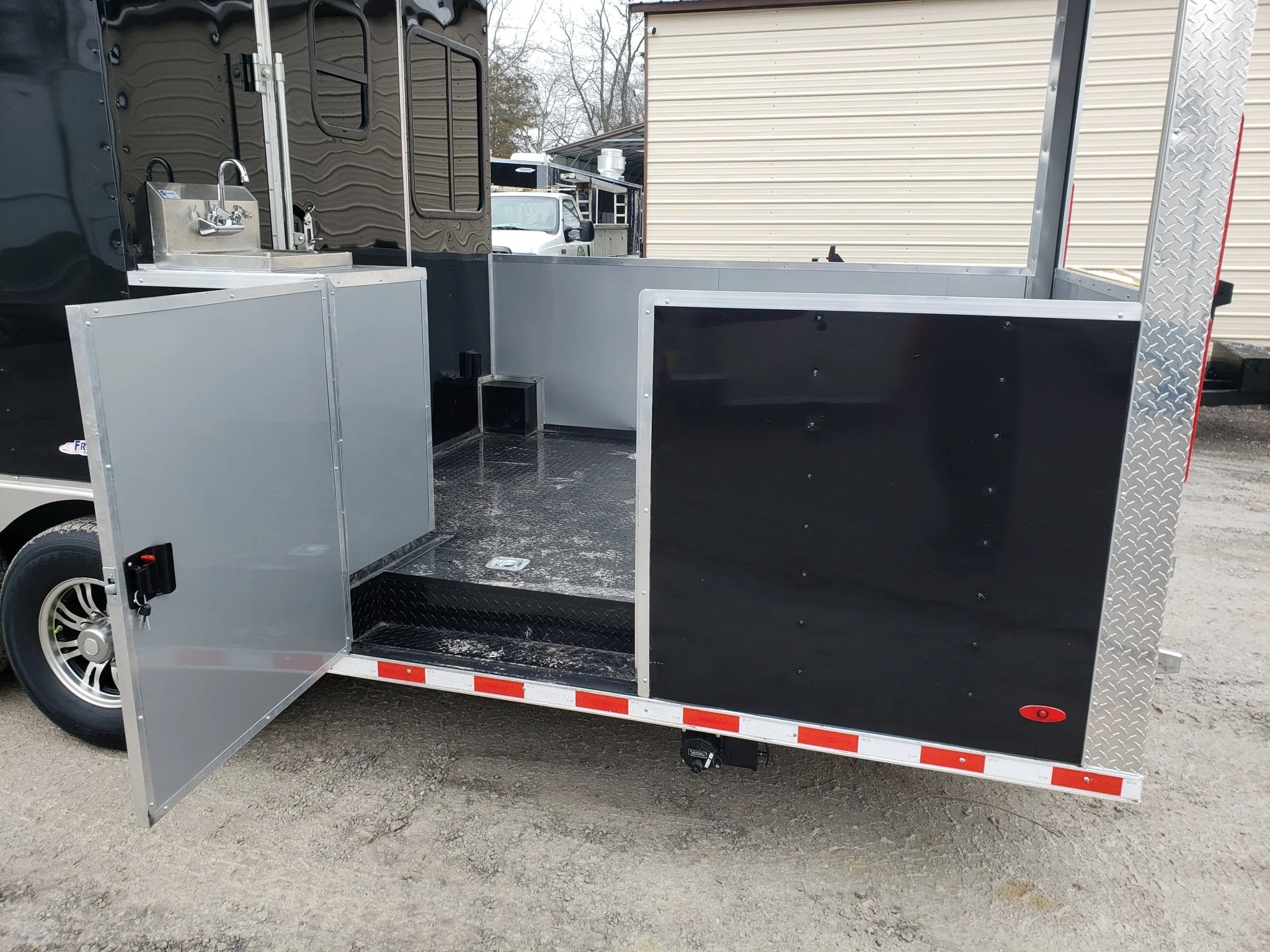 8.5' x 28' Black Porch Style BBQ Vending Concession Trailer