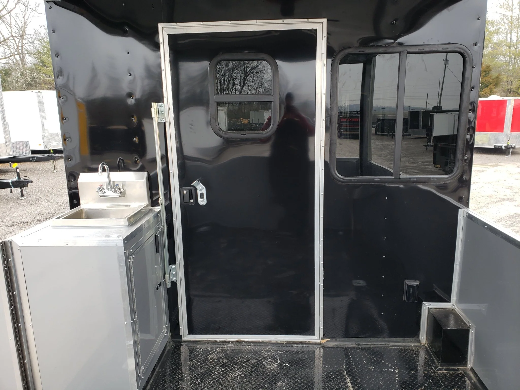 8.5' x 28' Black Porch Style BBQ Vending Concession Trailer