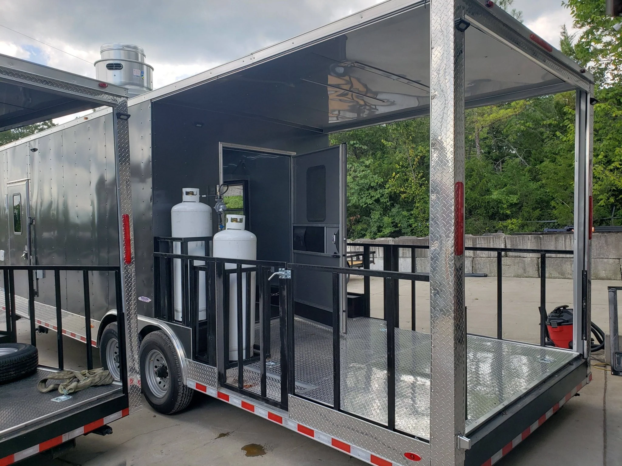 846-8.5-x-28-charcoal-gray-porch-style-concession-trailer-with-restroom-10.webp 8.5' x 28' Charcoal Gray Porch Style Concession Trailer with Restroom