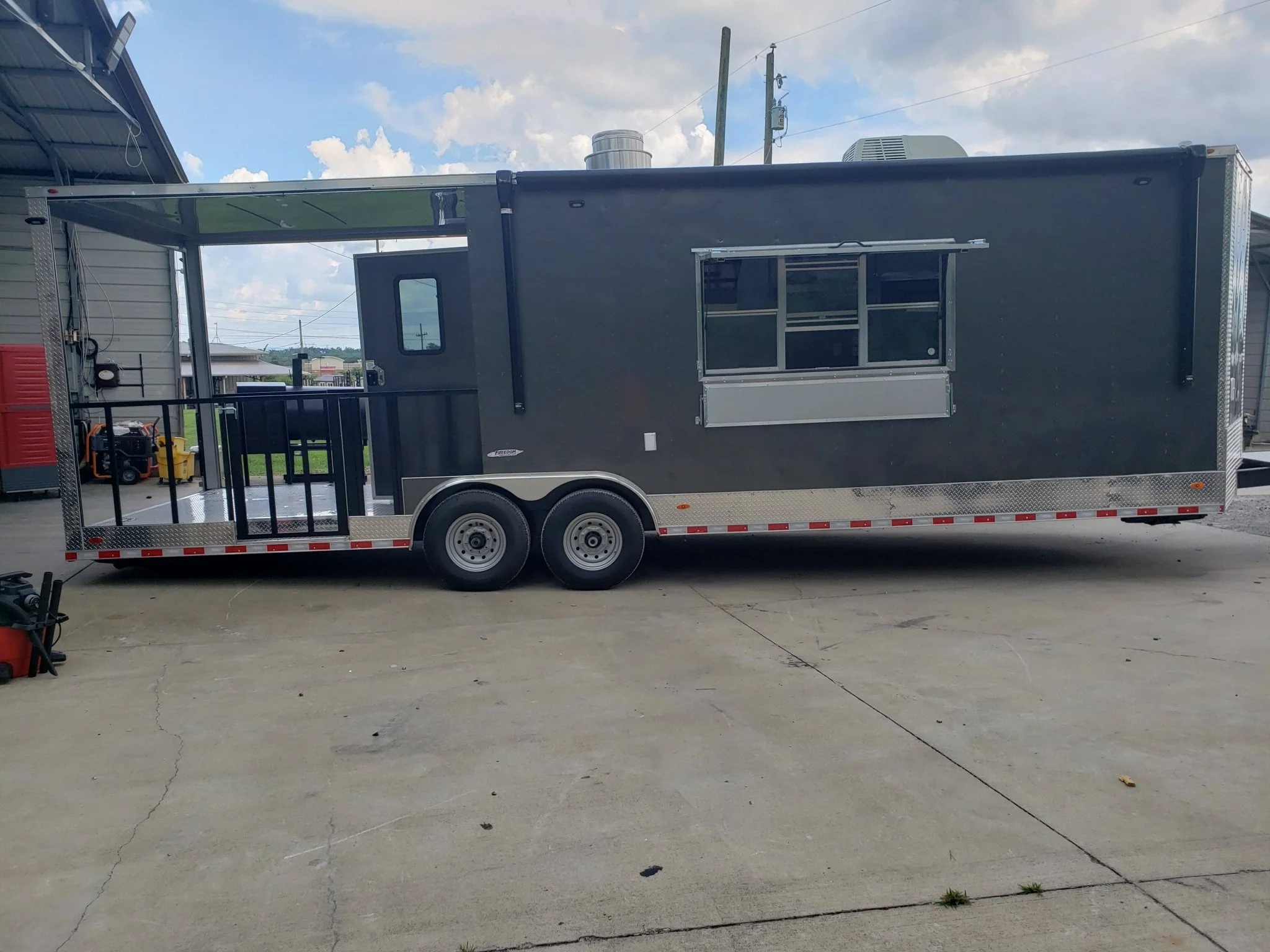 846-8.5-x-28-charcoal-gray-porch-style-concession-trailer-with-restroom-14.webp 8.5' x 28' Charcoal Gray Porch Style Concession Trailer with Restroom